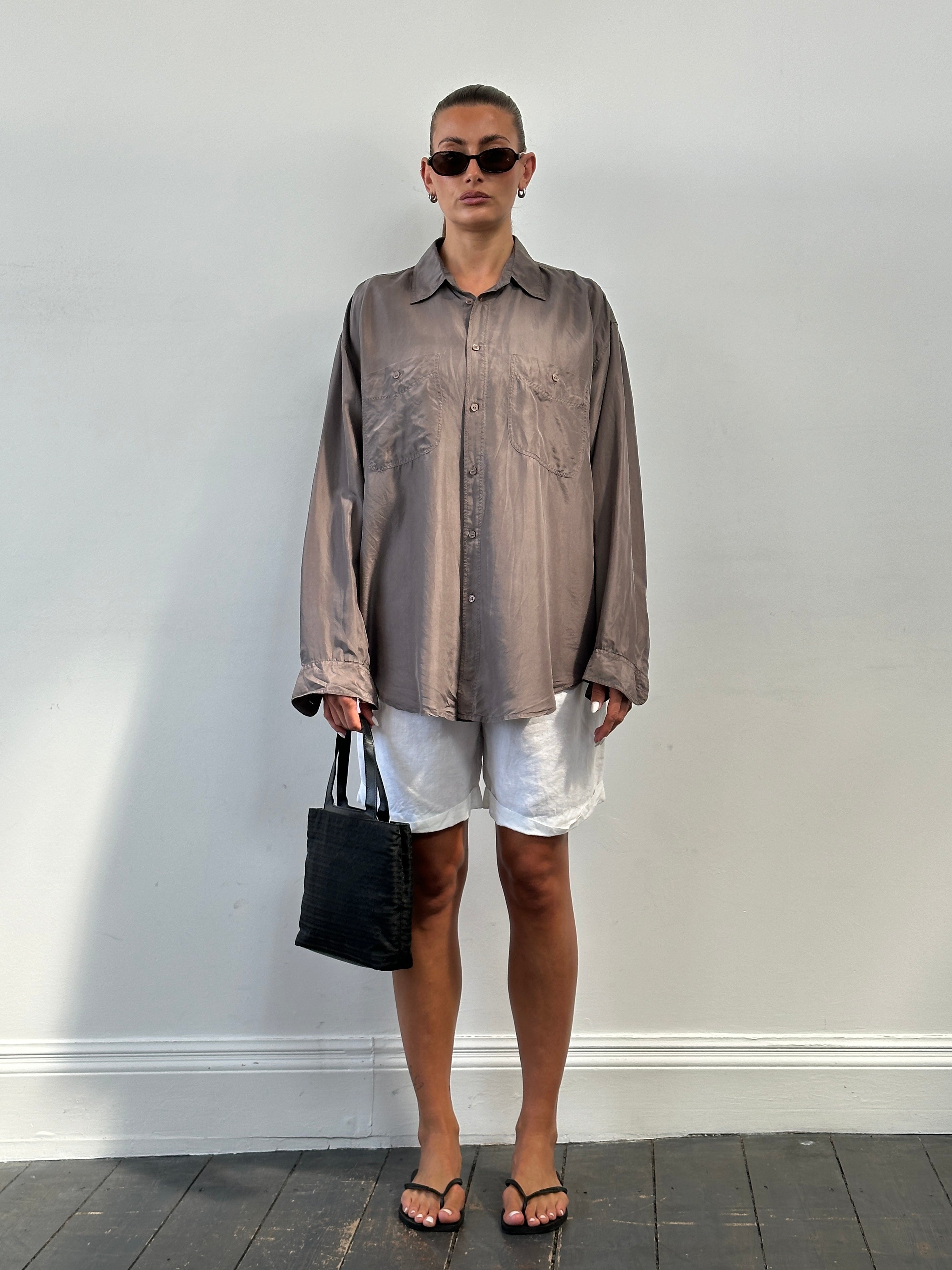 Vintage pure silk shirt in size XL, shown in a light color with a classic collar and button-down front.