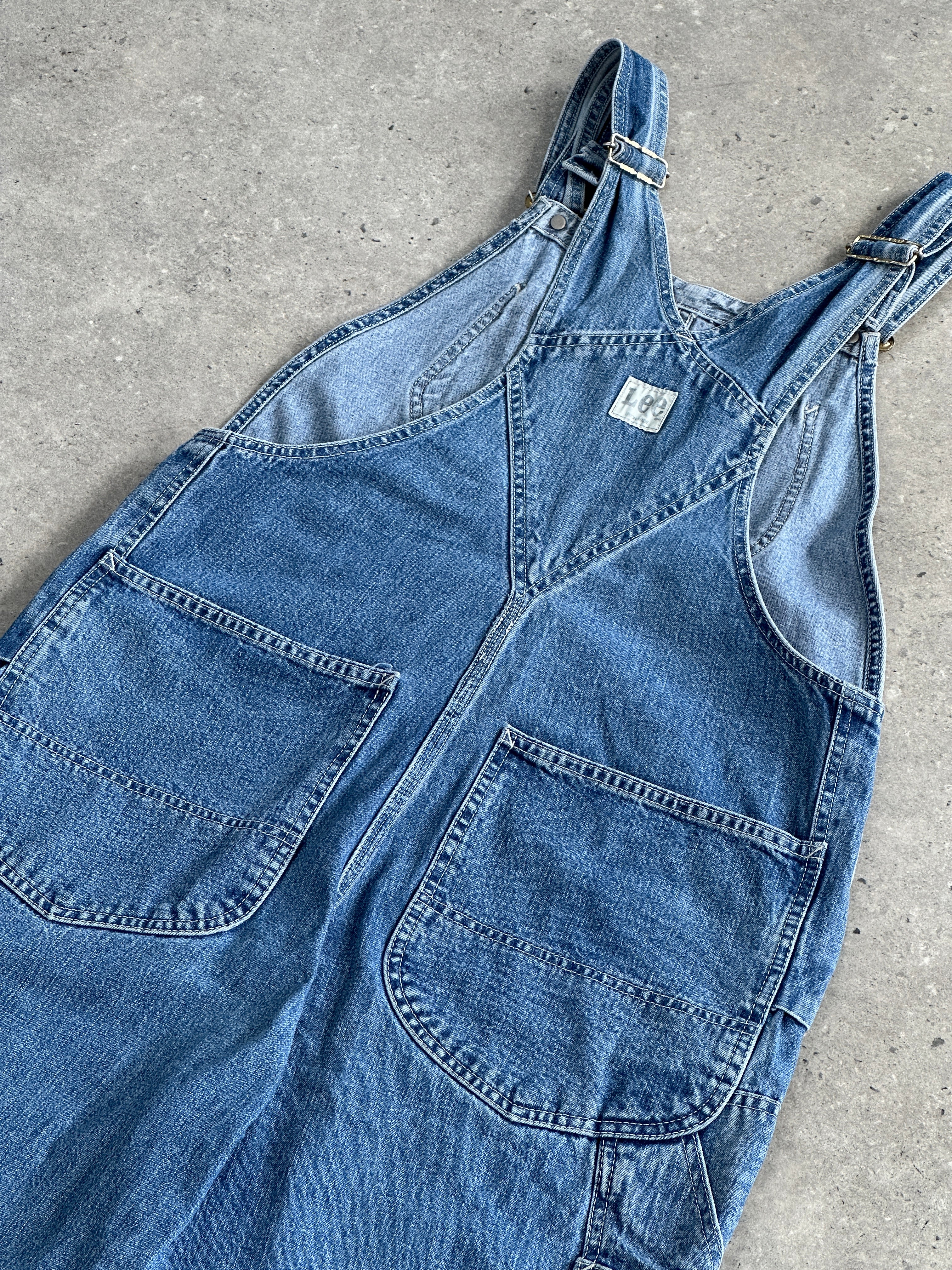 Lee Pure Cotton Denim Dungarees for men, blue cotton overalls with adjustable straps and front pockets, casual style.