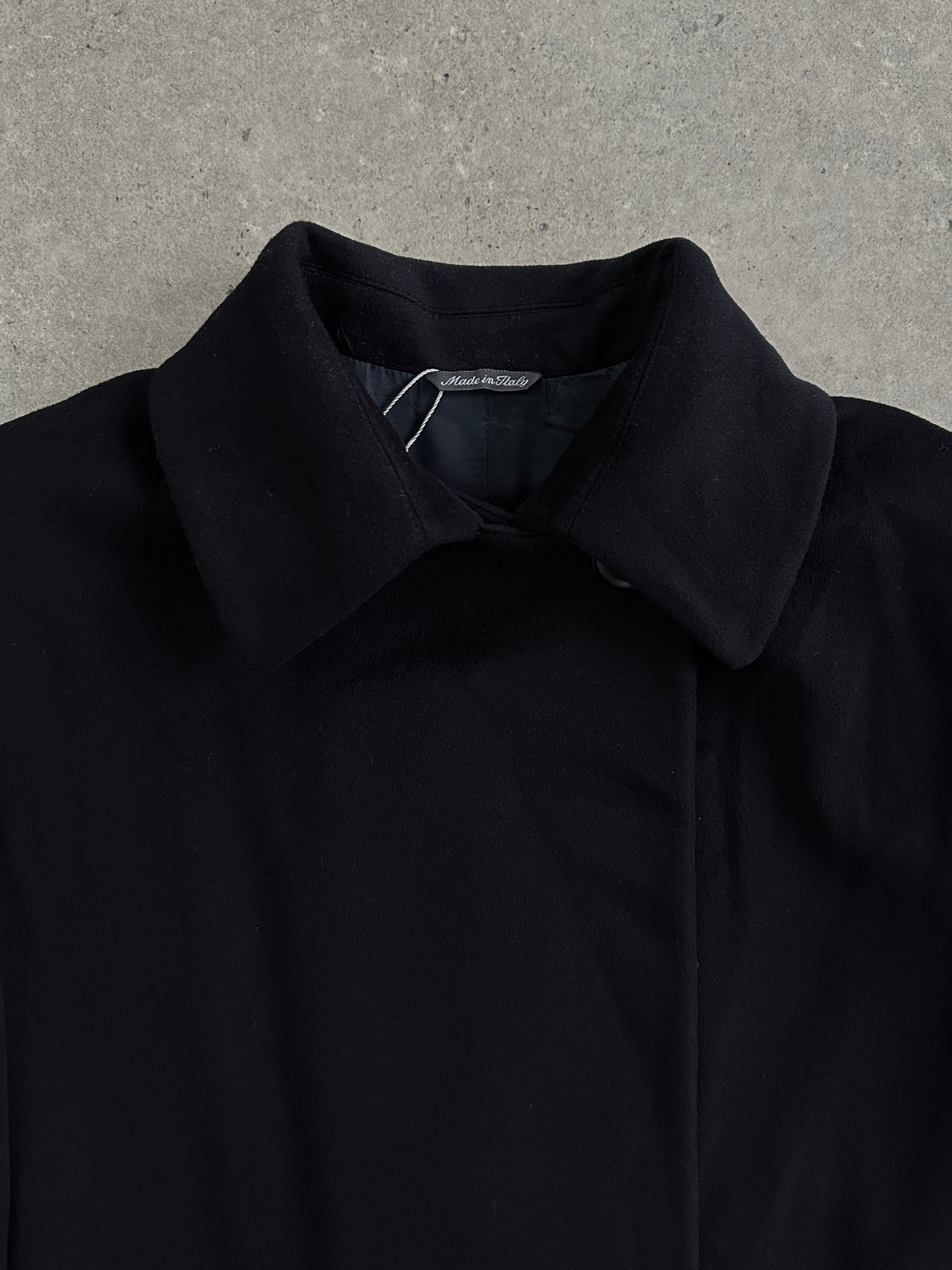 Loro Piana pure wool double-breasted coat in size L/XL, featuring classic design and tailored fit, shown on a neutral background.
