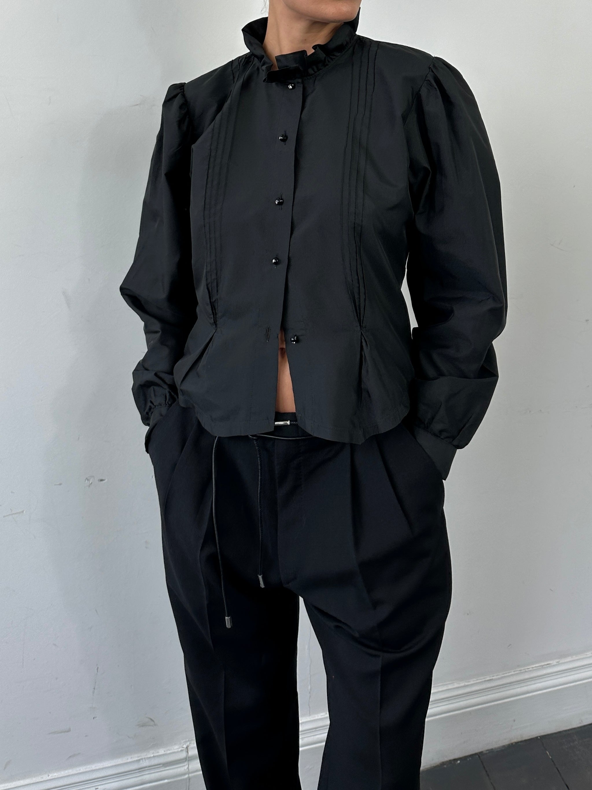 Vintage brand vintage puff sleeve pleated shirt in size M, featuring a classic design with puffed sleeves and pleated fabric.
