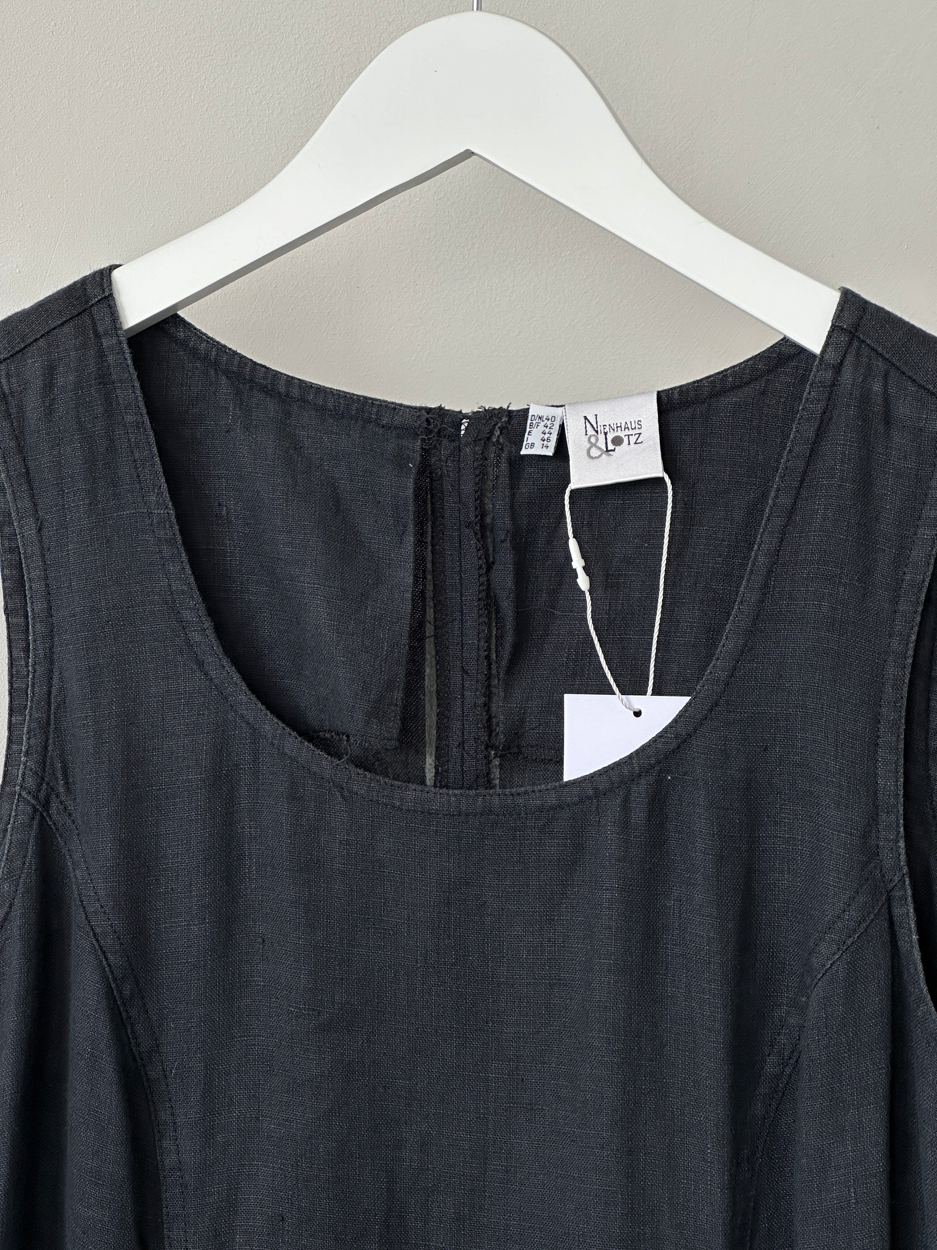 Vintage linen side split slip dress in size M, featuring a lightweight, flowy design with a side slit and vintage-inspired style.