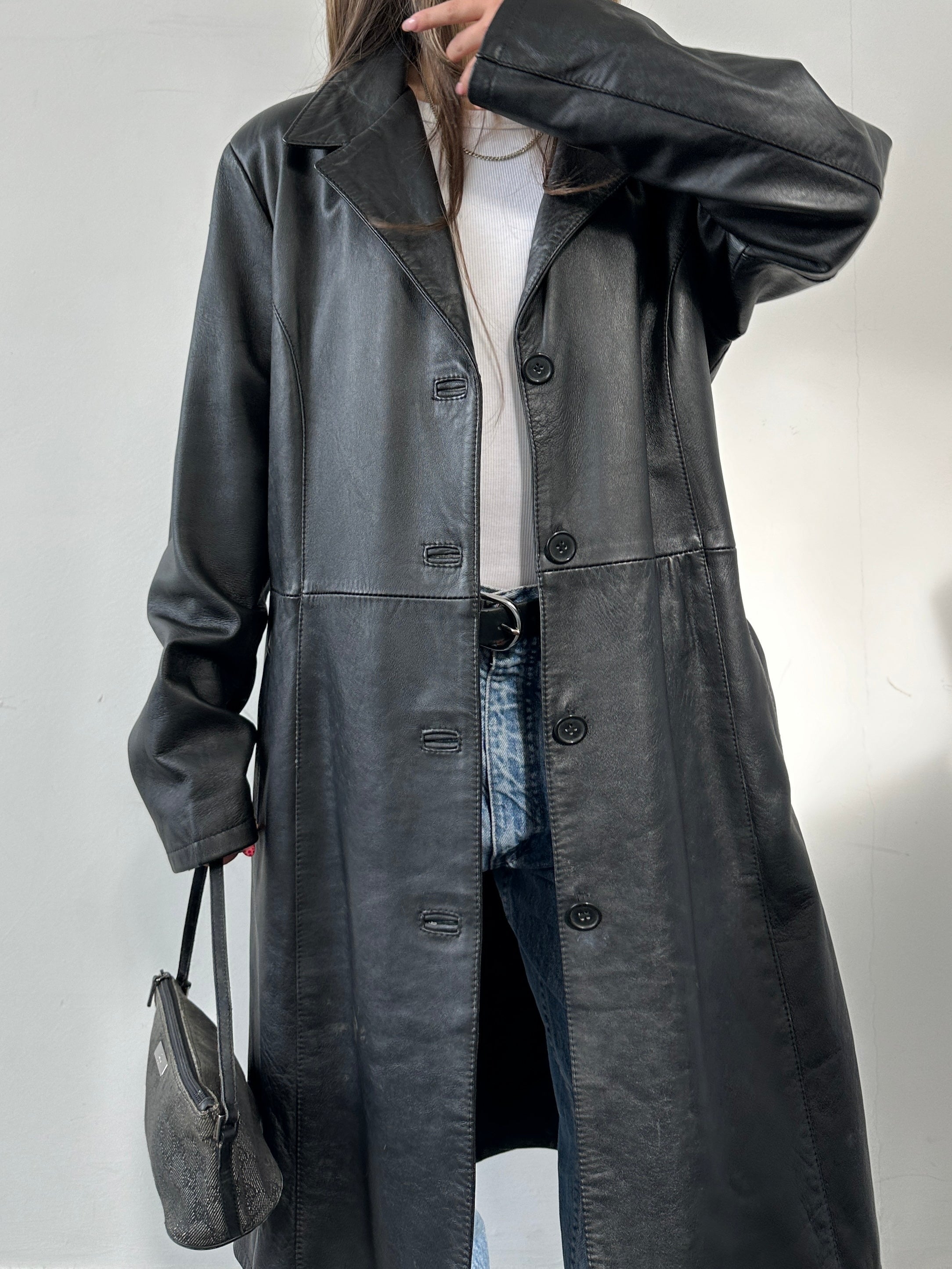 Vintage Italian leather jacket in size S, featuring a classic design with detailed stitching and a rich brown color.