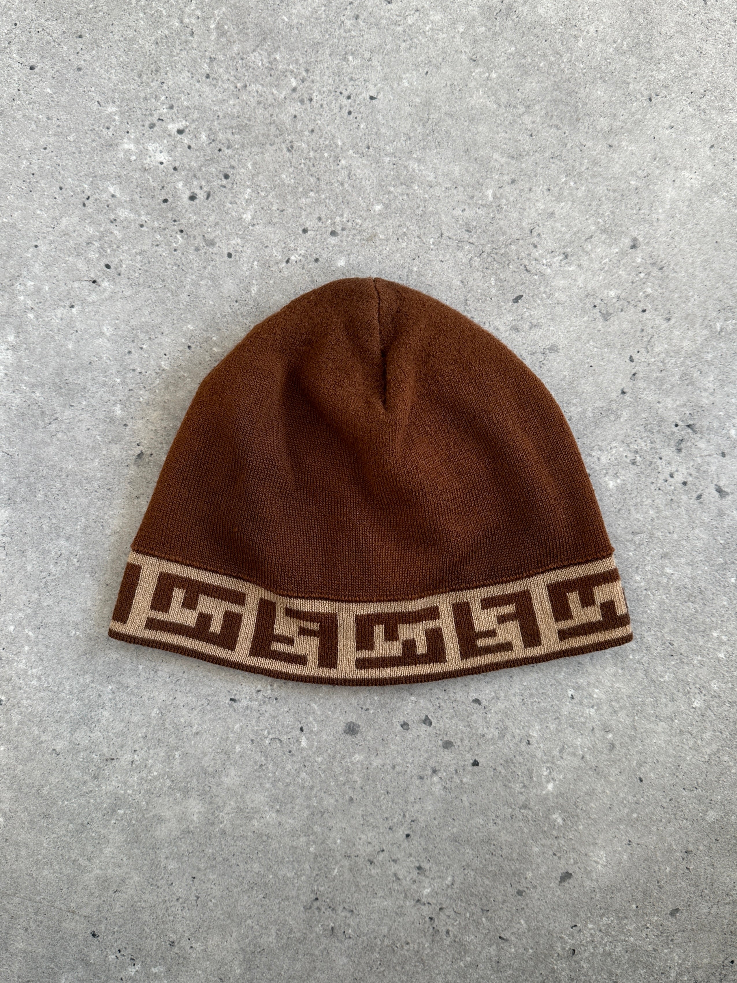 Fendi FF Monogram print beanie hat with ribbed knit design, featuring the iconic Fendi logo pattern and a snug fit.