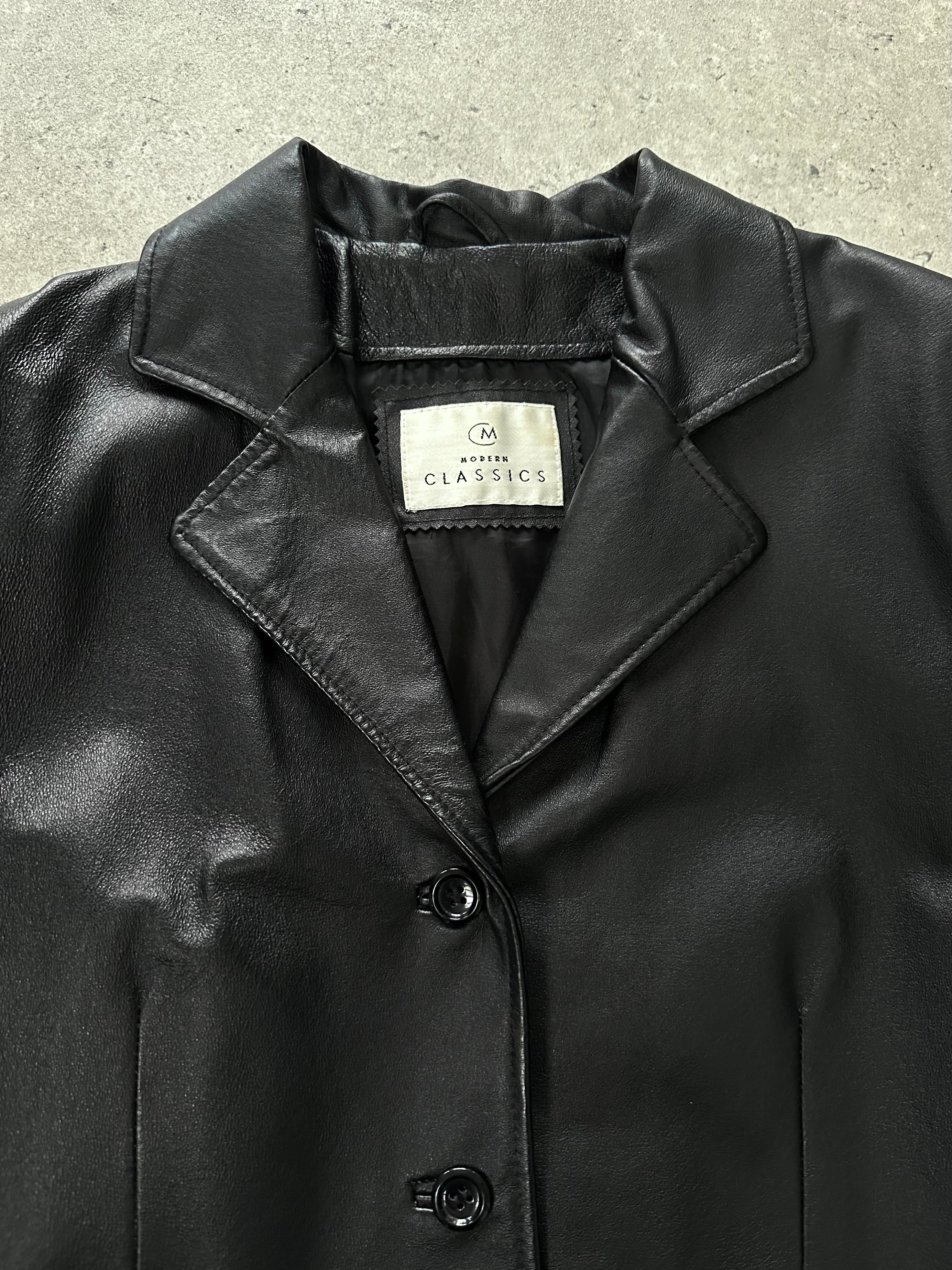 Vintage 1990s minimal leather jacket in size M, featuring a sleek design and classic black leather from the Vintage brand.