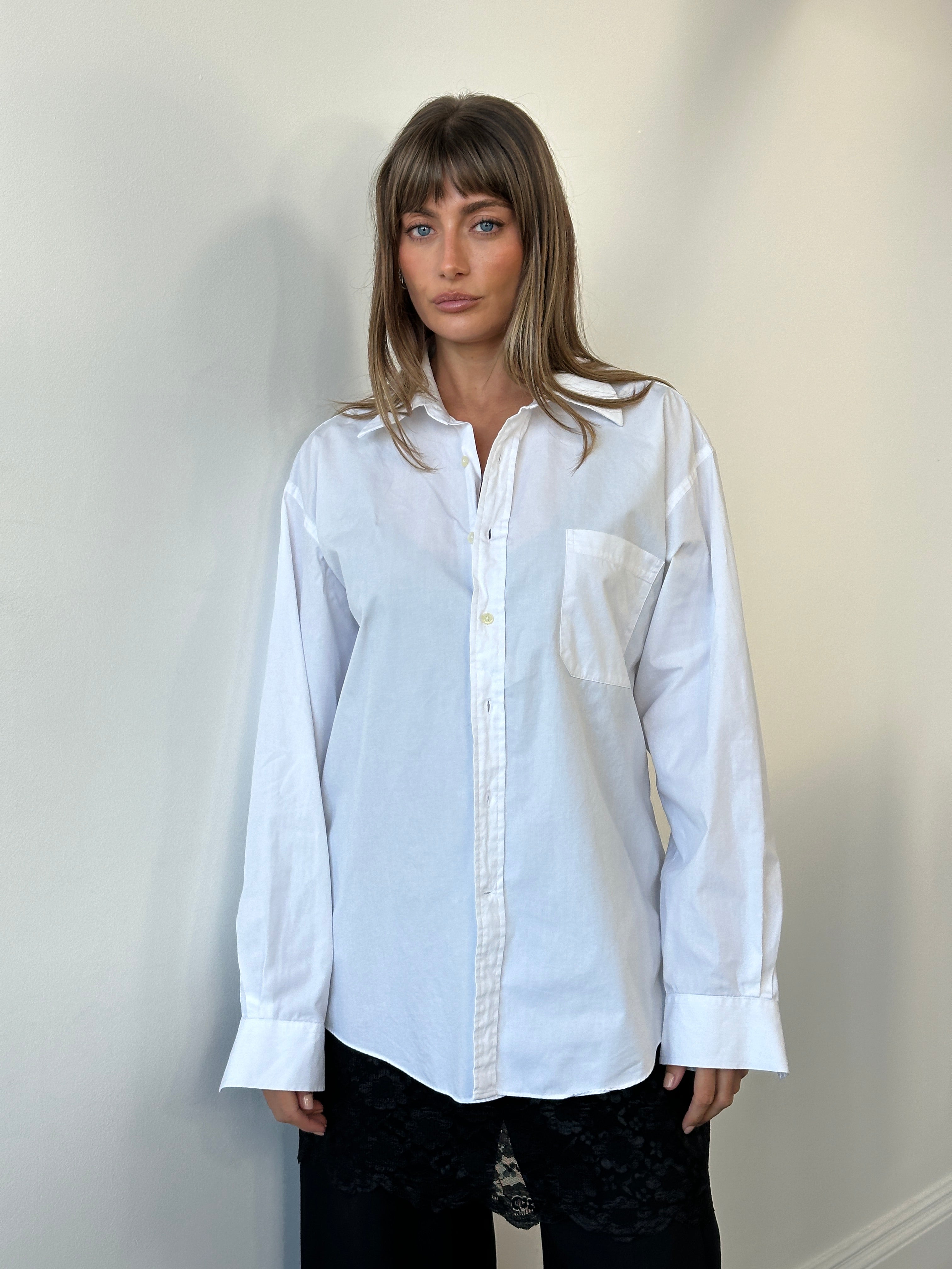 Christian Dior 1990s cotton shirt, XL size, showcasing a classic button-up shirt with a crisp white fabric and tailored fit.