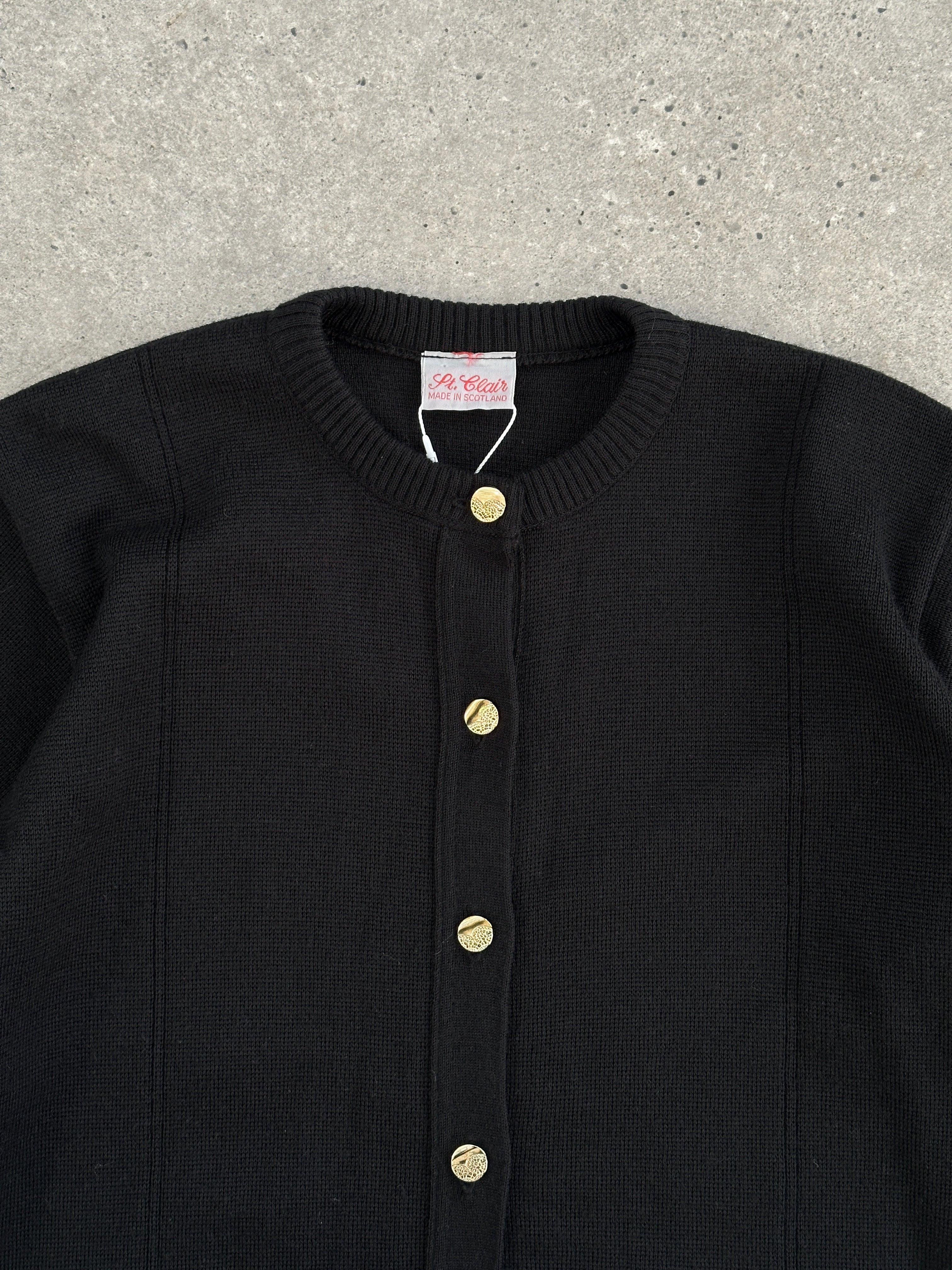 Vintage Scottish vintage wool knitted cardigan in size M, featuring a classic pattern and cozy texture.