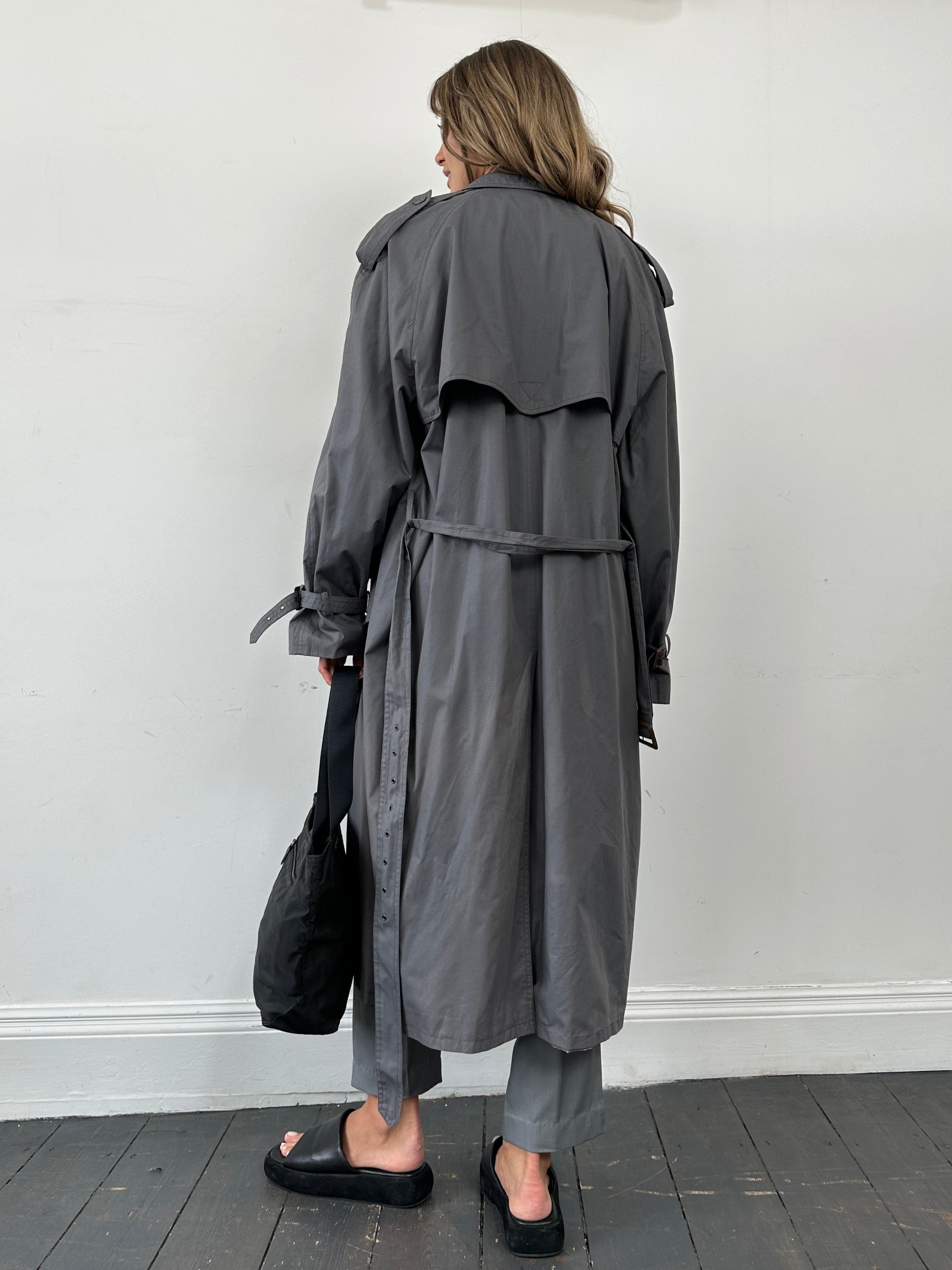 Yves Saint Laurent Pour Homme double-breasted belted trench coat in XL/XXL, showcasing classic design and tailored fit.