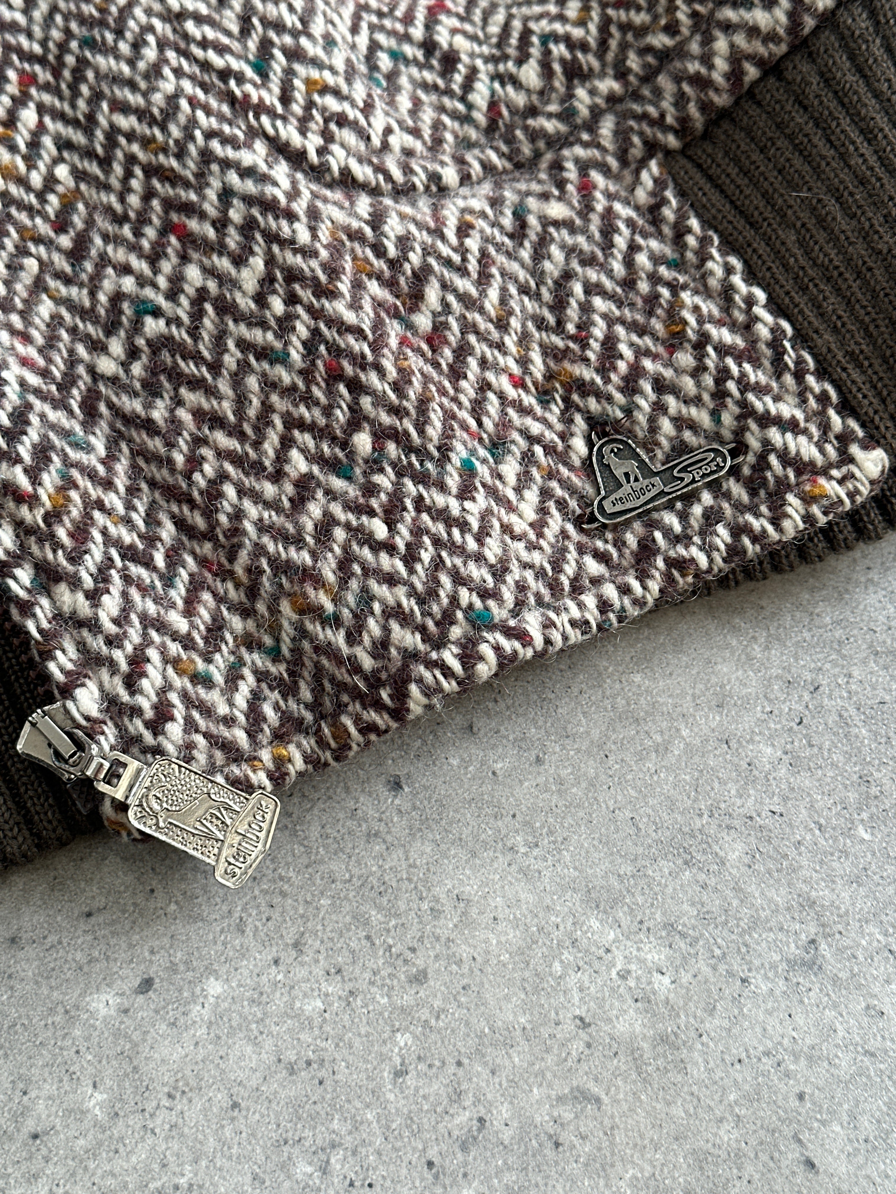 Vintage pure wool herringbone bomber jacket in size L, showcasing classic pattern and tailored fit.