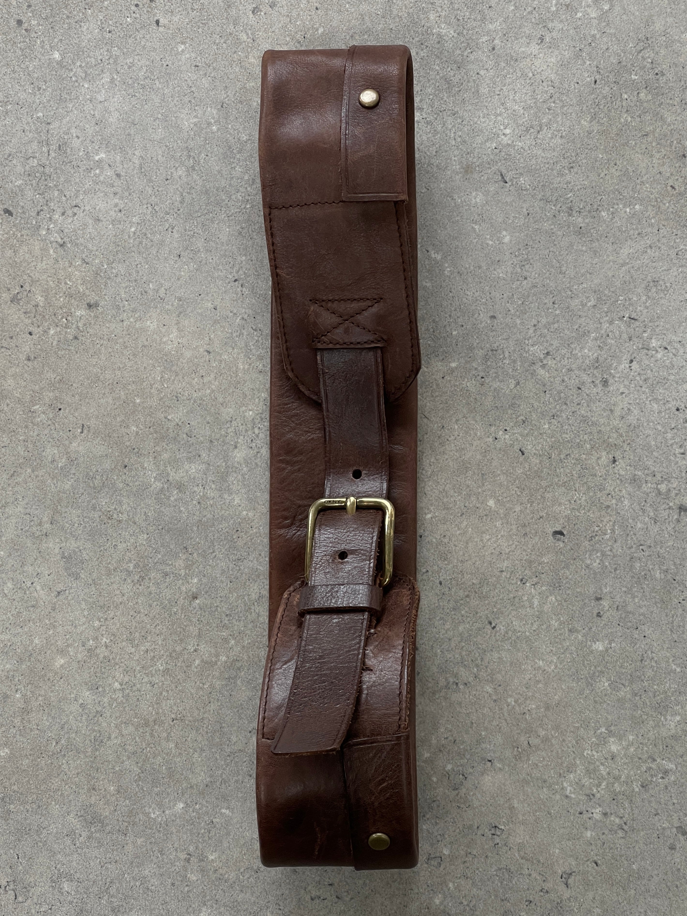 DKNY leather chunky utility belt bag with adjustable W31-33 waist, featuring multiple pockets and a modern, stylish design.