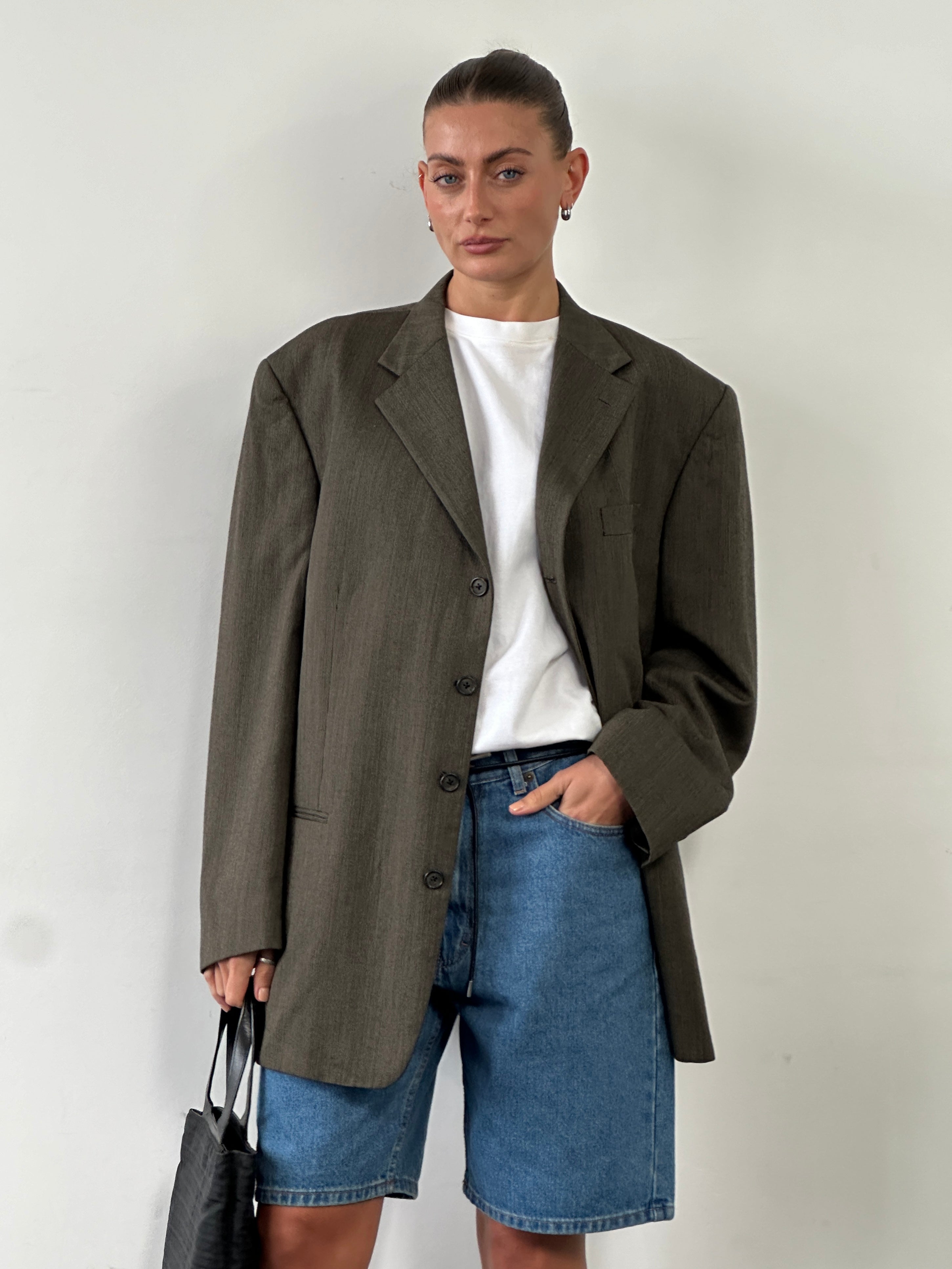Givenchy Monsieur 90s pure wool single-breasted blazer, size 46R/XXL, in classic tailored style and dark color.