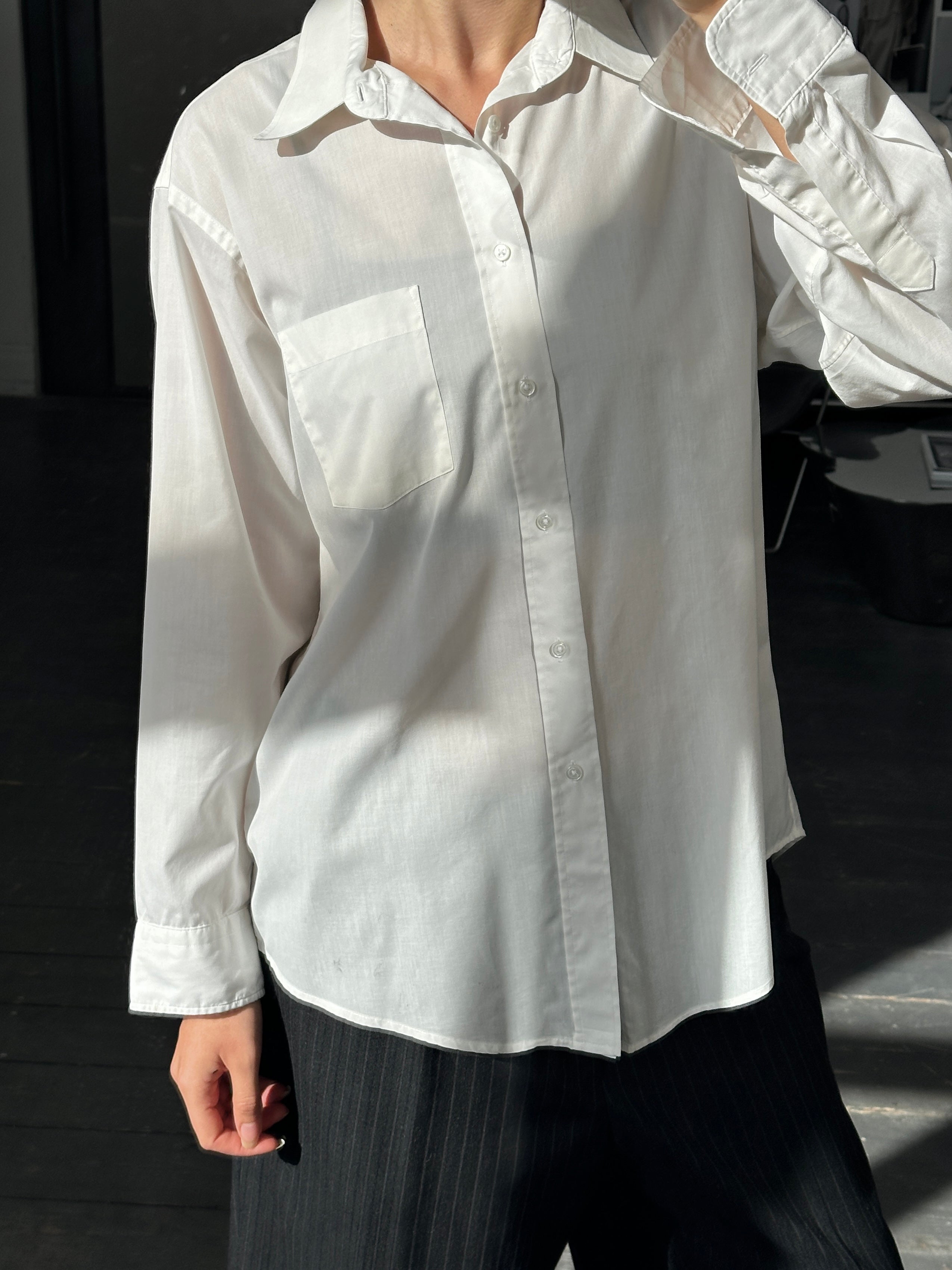 Christian Dior Monsieur 1990s cotton shirt in size L, featuring a classic button-up design with a crisp white fabric.