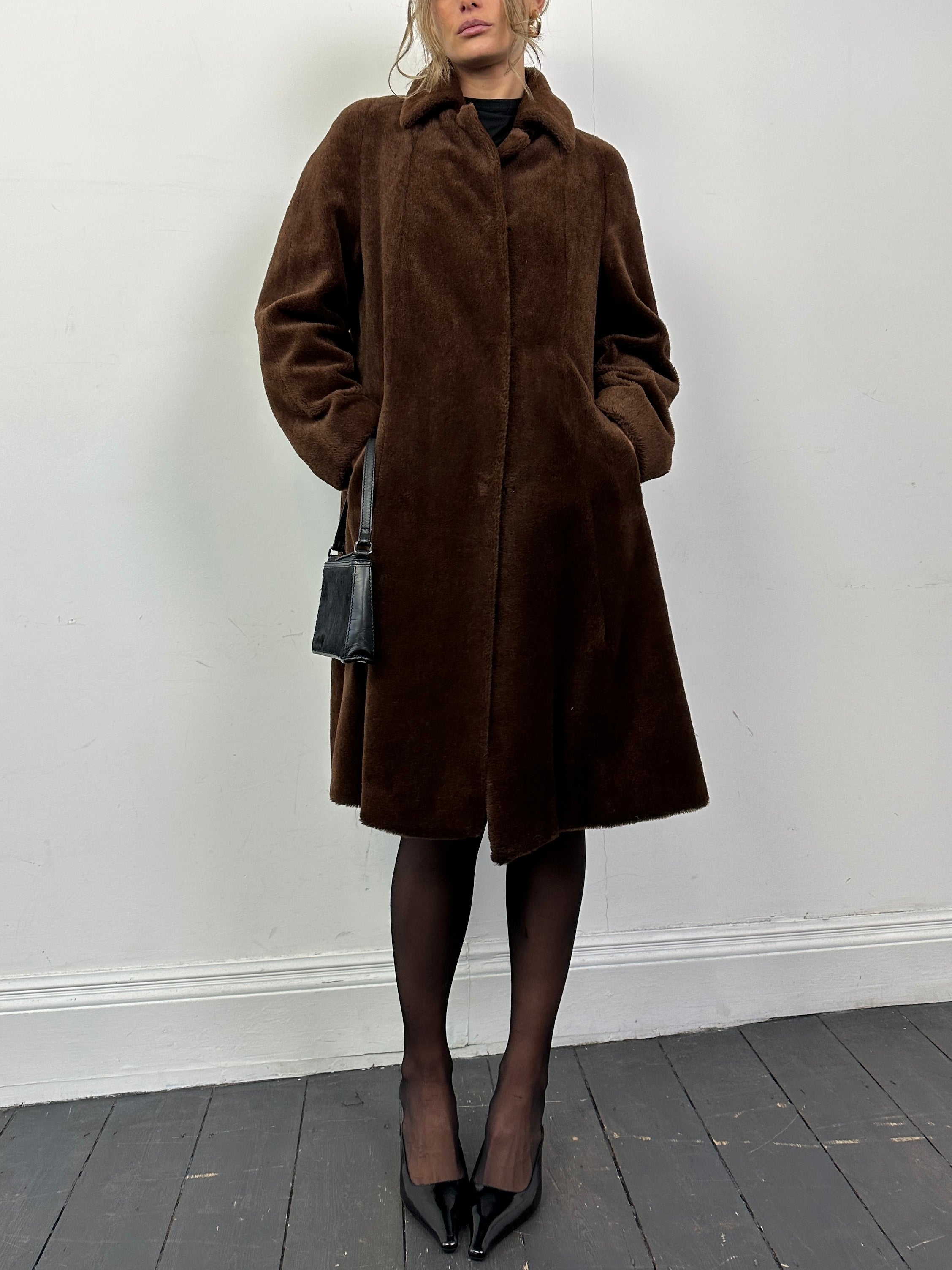 Vintage alpaca mohair fur single-breasted A-line coat in S/M, showcasing its textured fabric and classic silhouette.