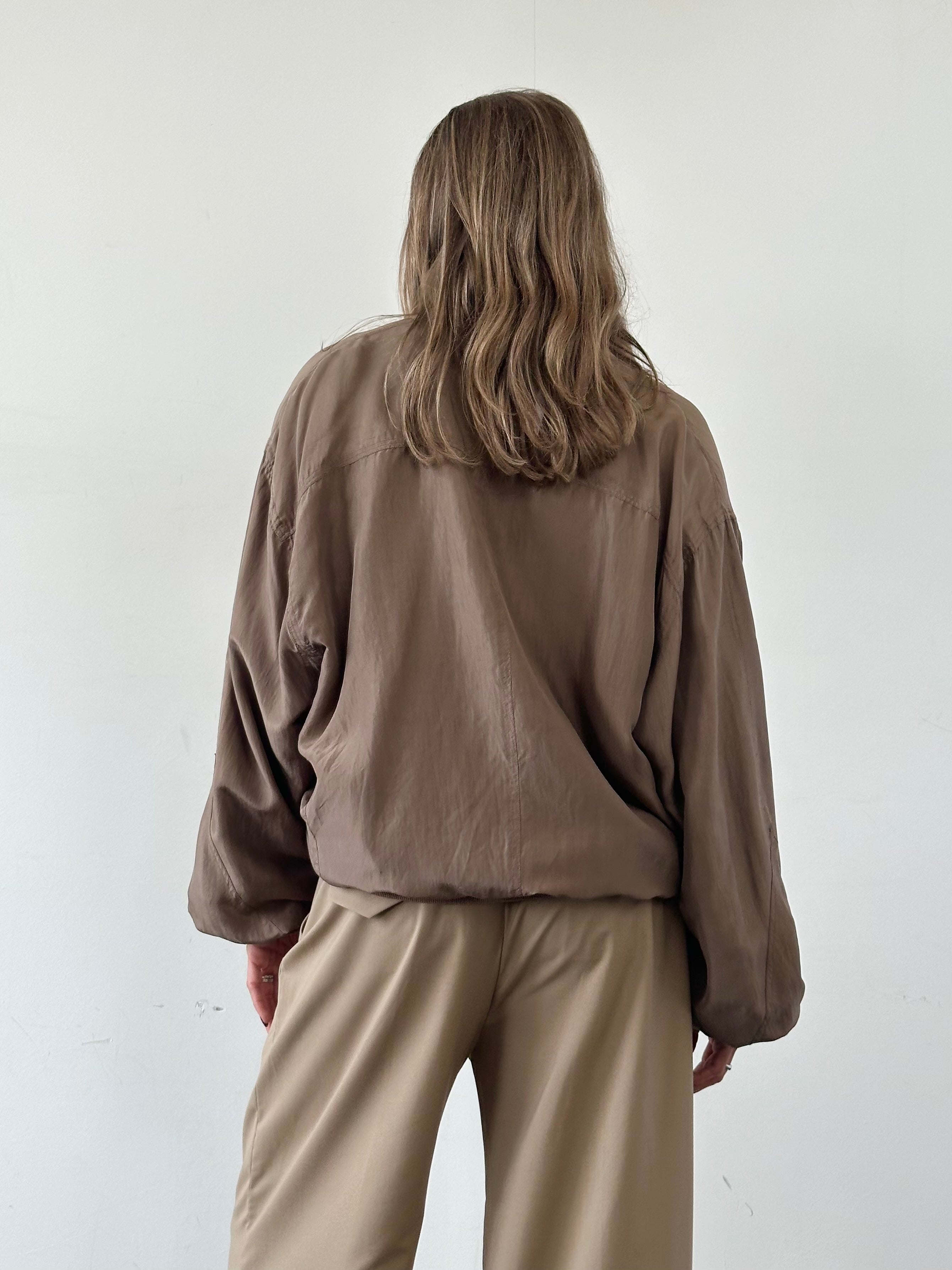 Vintage pure silk bomber jacket in XL, featuring a classic design with smooth fabric and ribbed collar and cuffs.