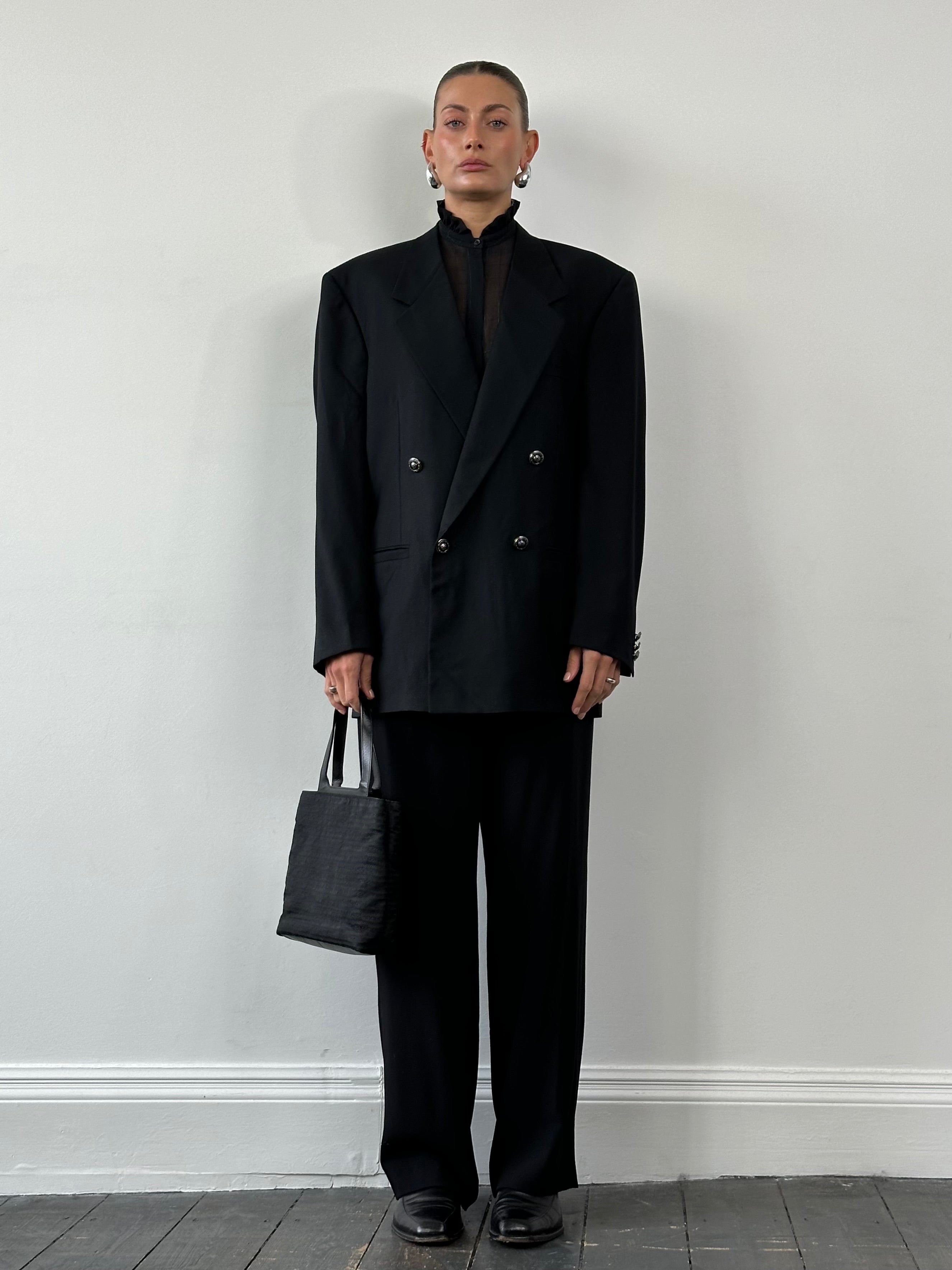 Versace Gianni Versace 1990s bespoke Medusa button double-breasted blazer in size 40R/L, featuring classic design and luxurious fabric.