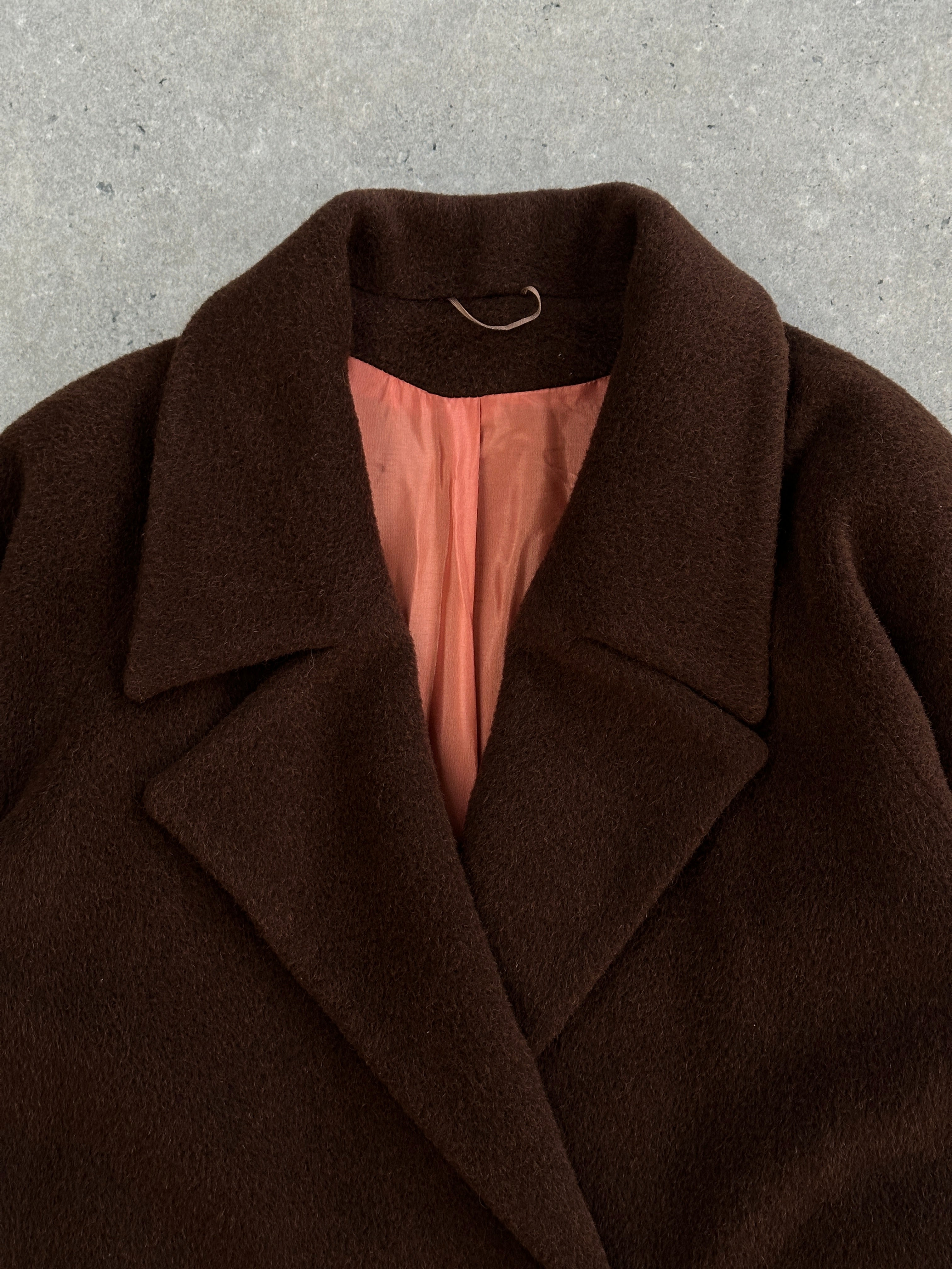 Vintage alpaca wool fuzzy coat in XL with a relaxed fit, showcasing its cozy, textured fabric and classic design.