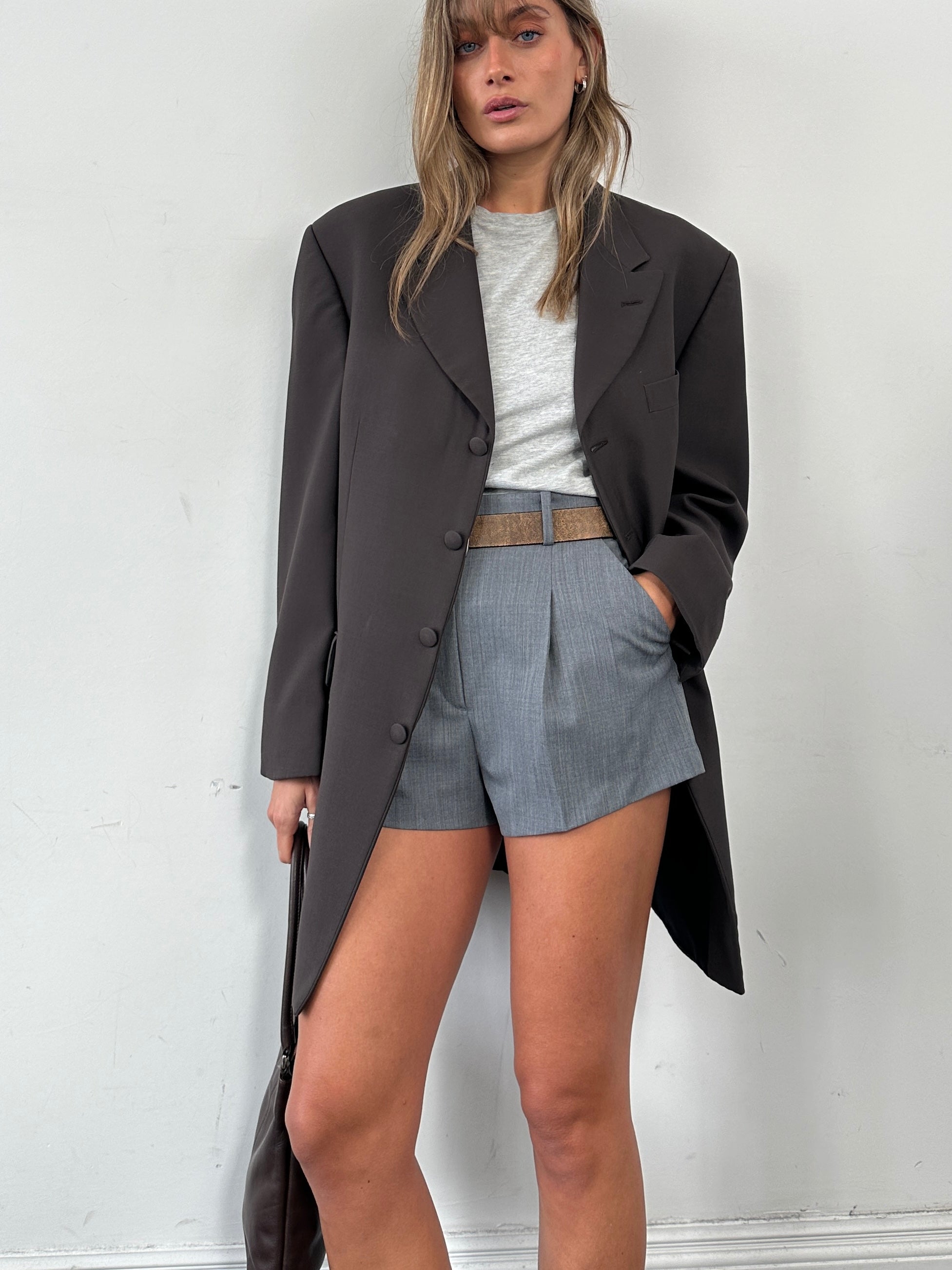 Vintage wool single-breasted longline blazer coat in size 42S/XL, featuring classic design and tailored fit.