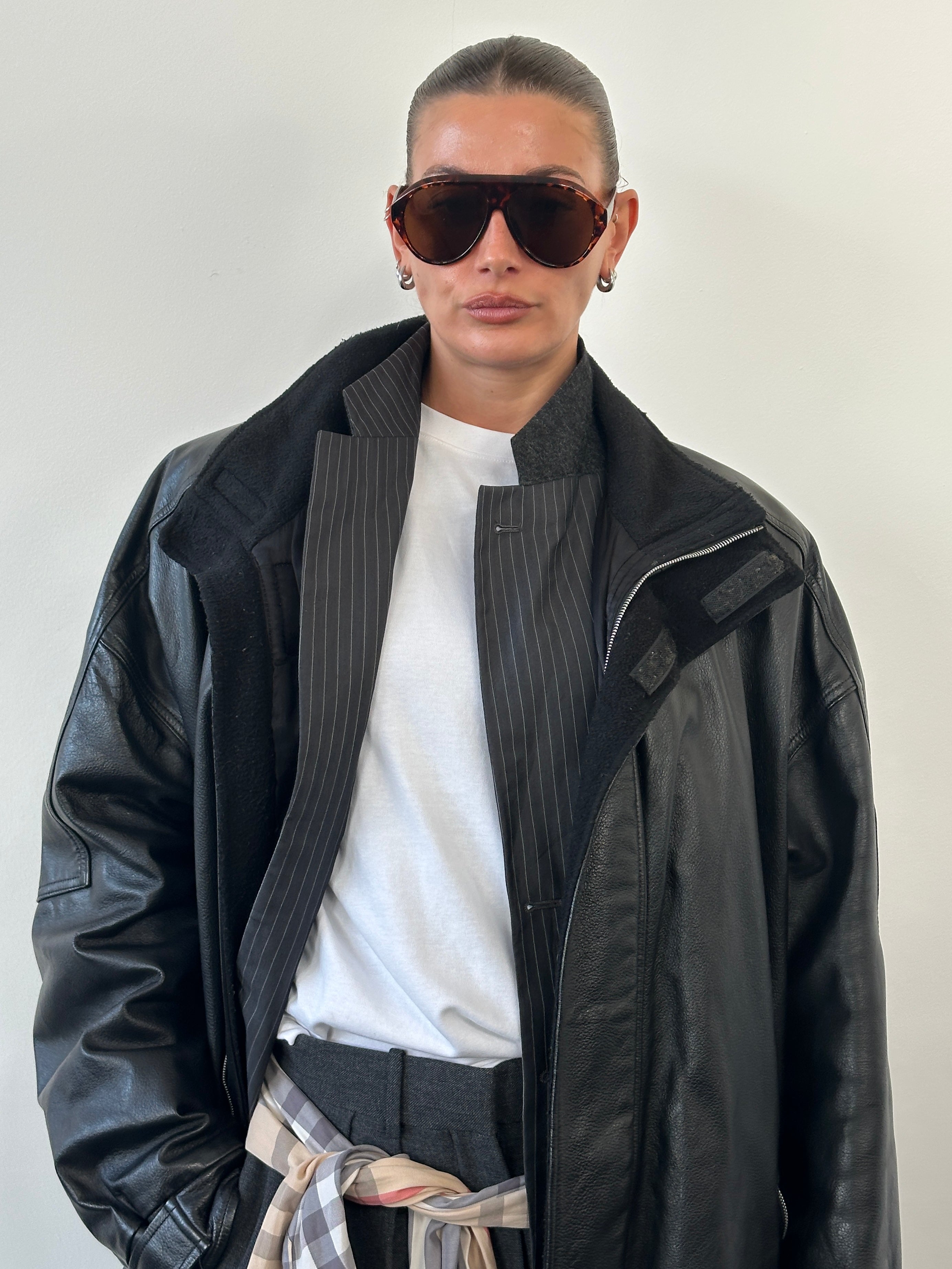 Armani Jeans 2000s high-neck double-zip leather jacket in black, XXL size, featuring smooth leather and modern design.