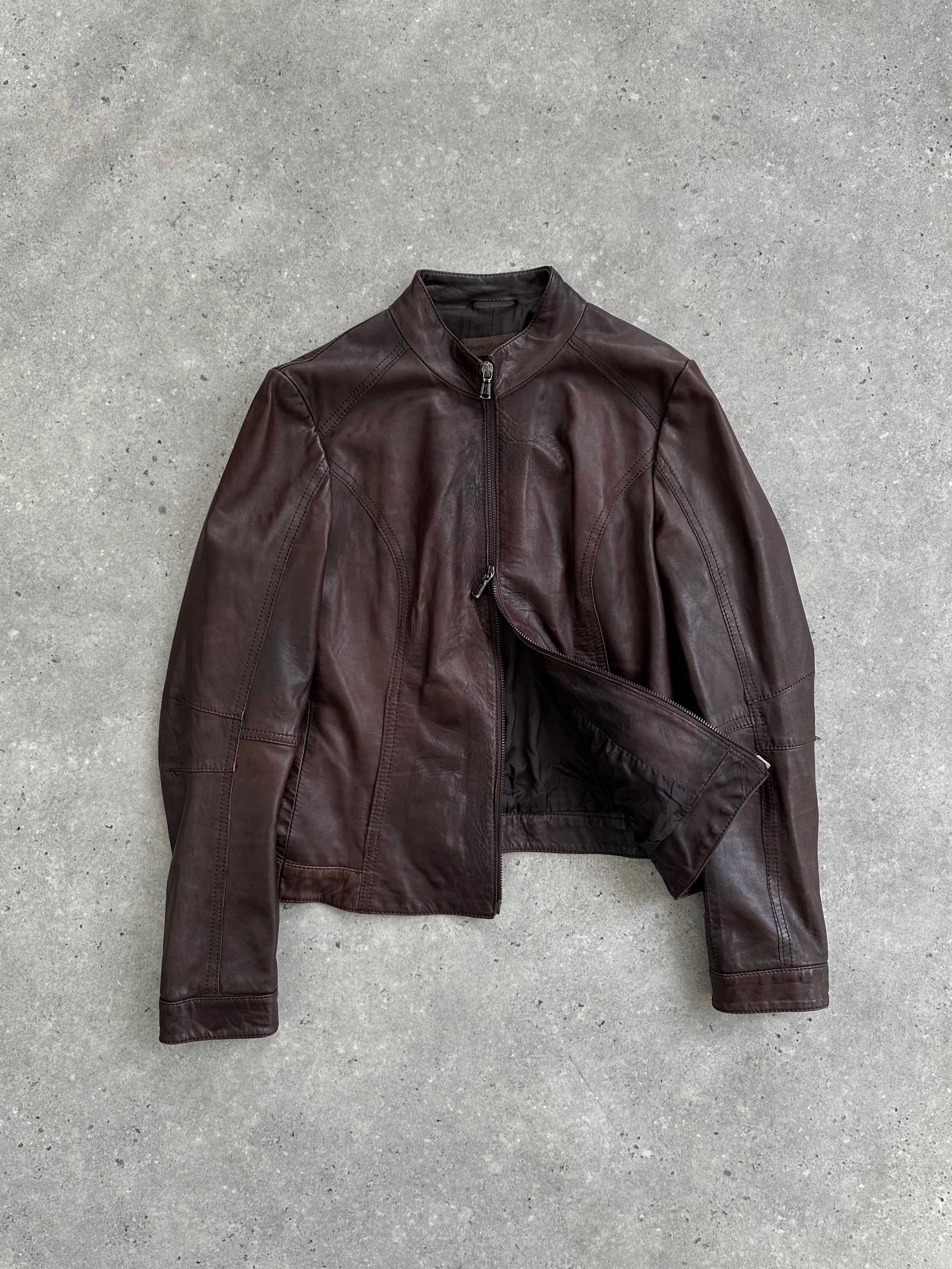 Vintage Italian double zip biker leather jacket, size small, with classic style and detailed stitching.
