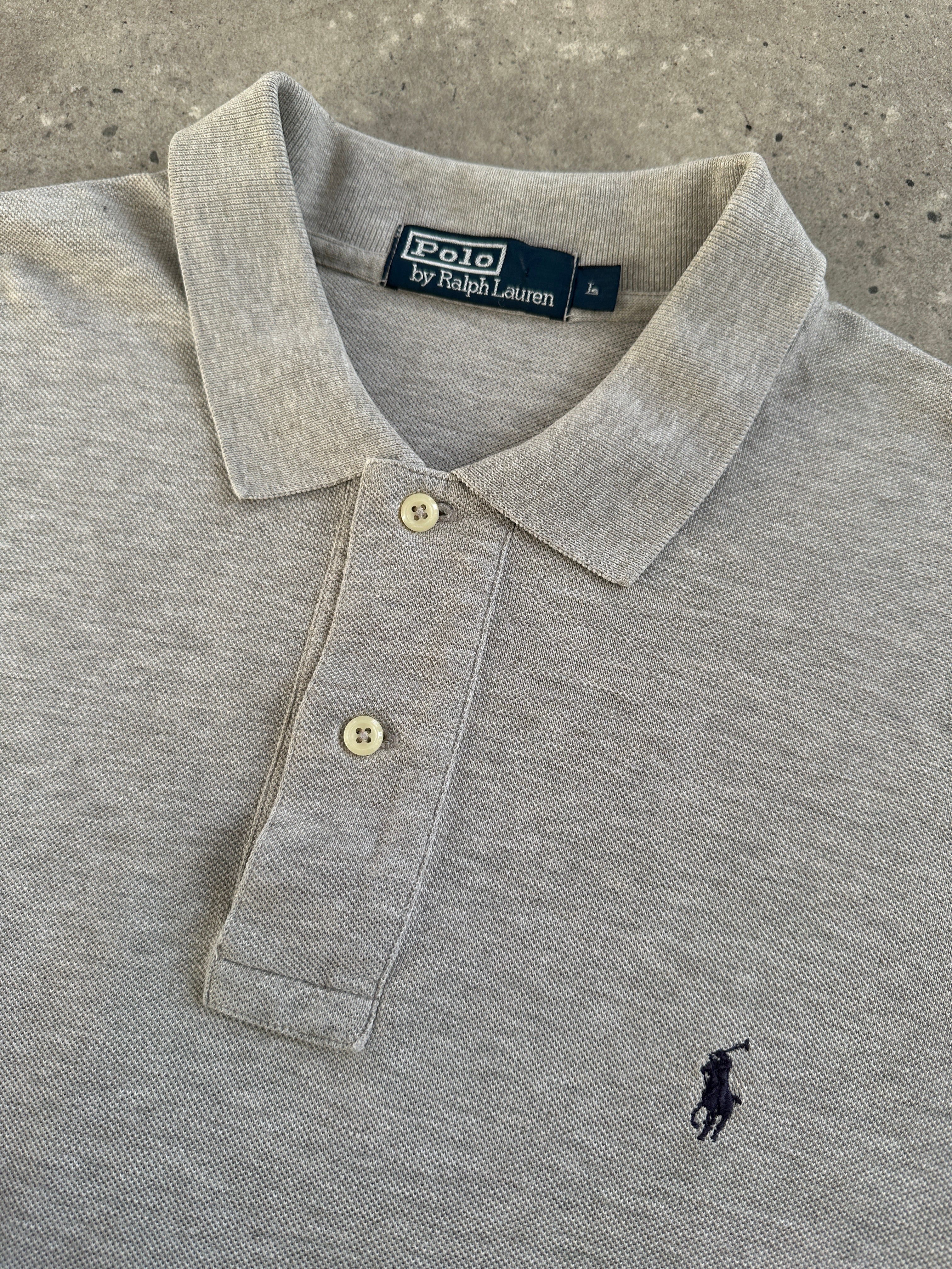 Ralph Lauren Pure Cotton Logo Polo Shirt in size L, featuring the brand's classic polo design and embroidered logo on the chest.