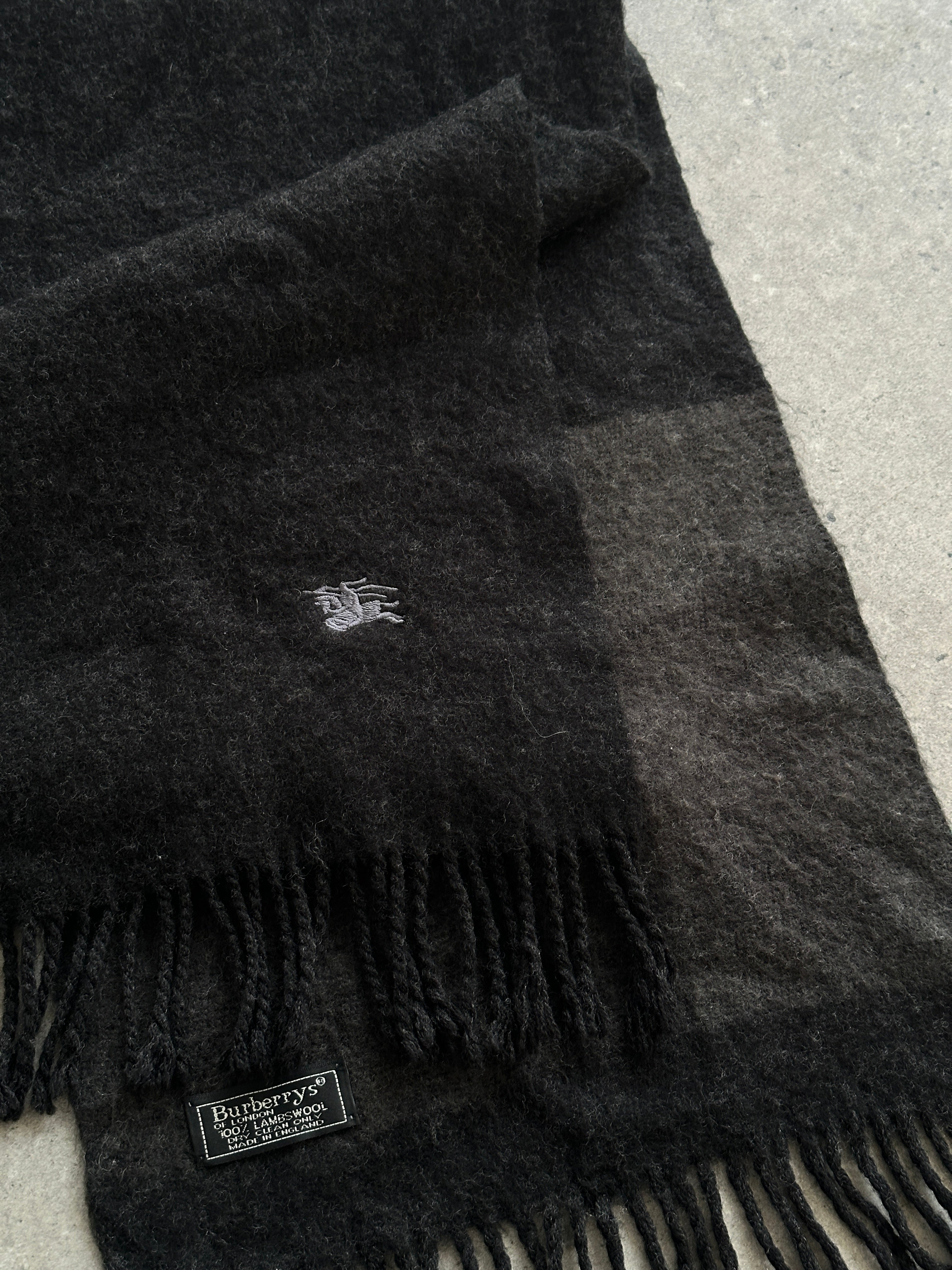 Burberry Pure Lambswool Logo Scarf featuring classic check pattern and soft, warm lambswool fabric, stylish accessory for cold weather.