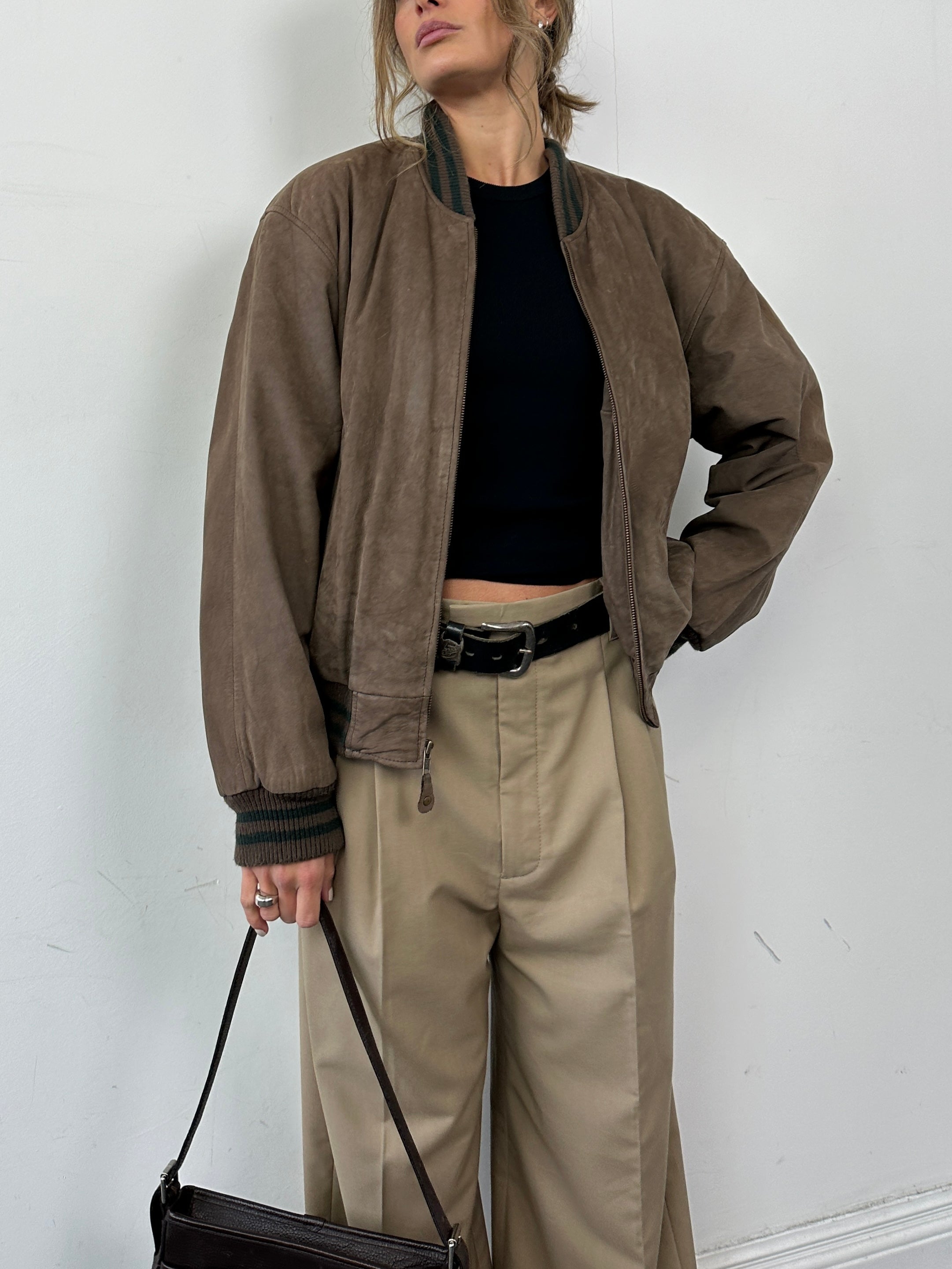 Vintage varsity style nubuck leather bomber jacket in M/L size, featuring classic design and ribbed cuffs and collar.