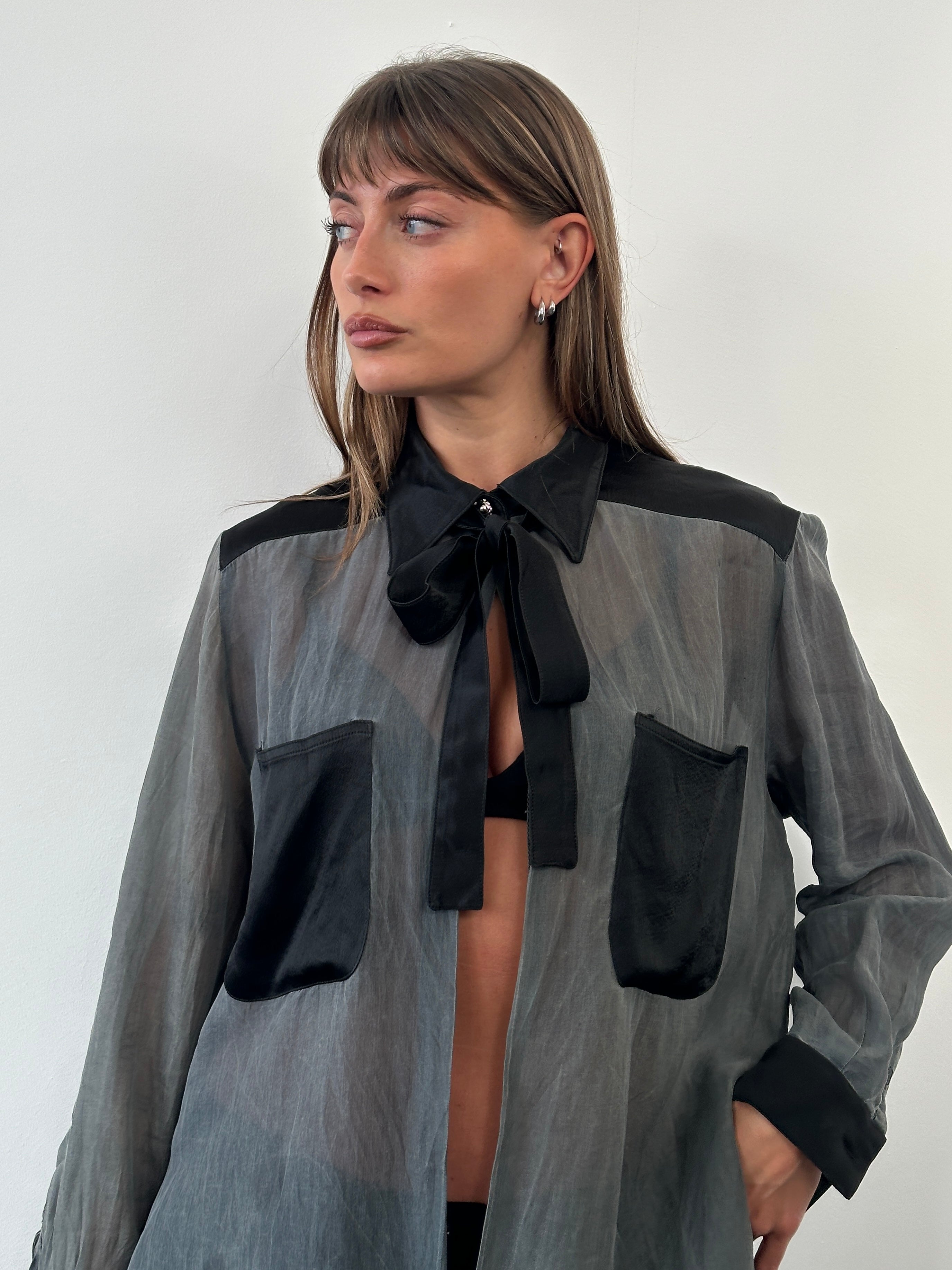 Vintage 1990s sheer satin tie neck shirt in size M, featuring a classic vintage design with elegant satin fabric.