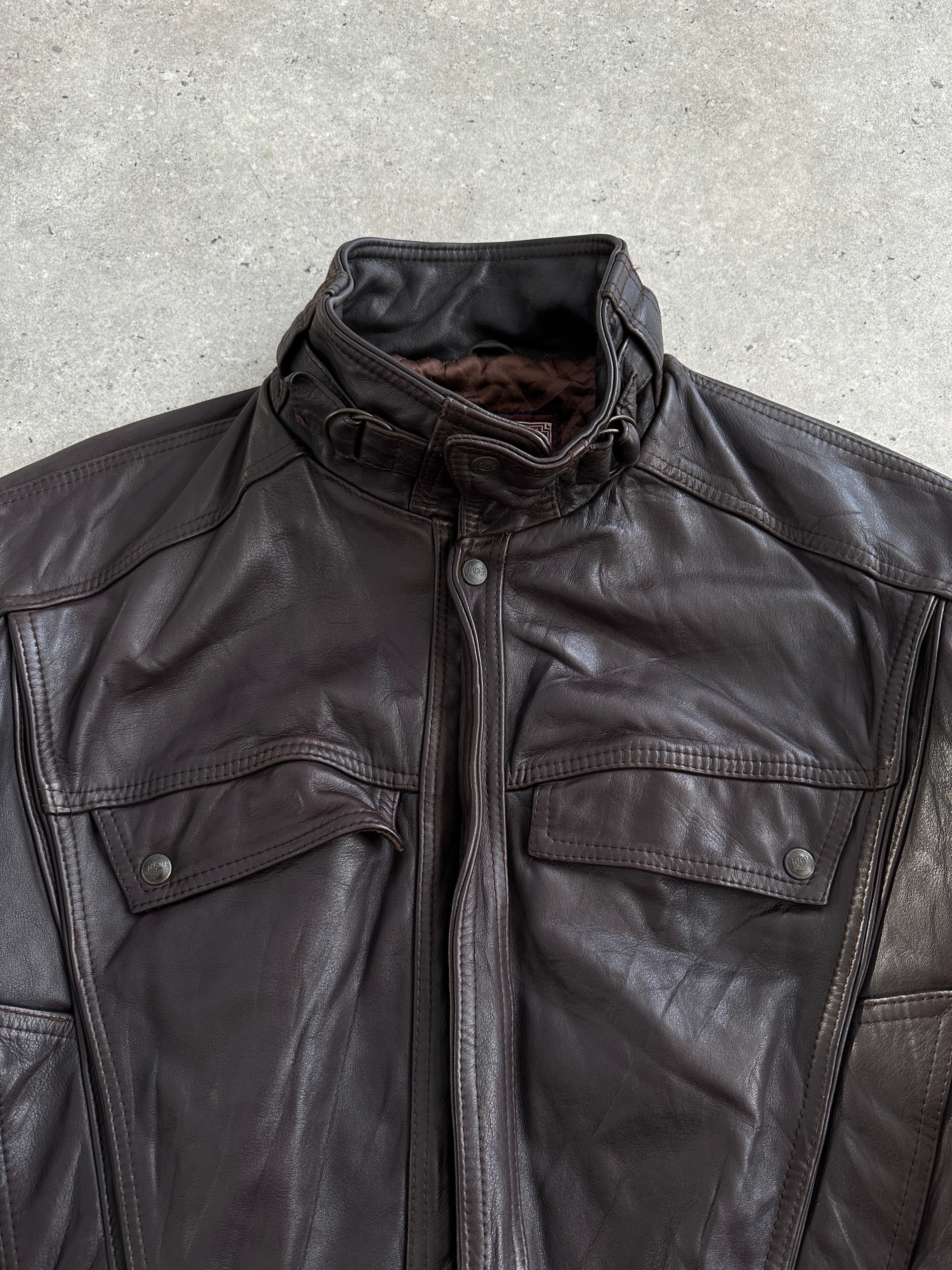 Vintage French 1980s high neck leather bomber jacket, men's size L, with classic vintage leather details and a fitted high collar.