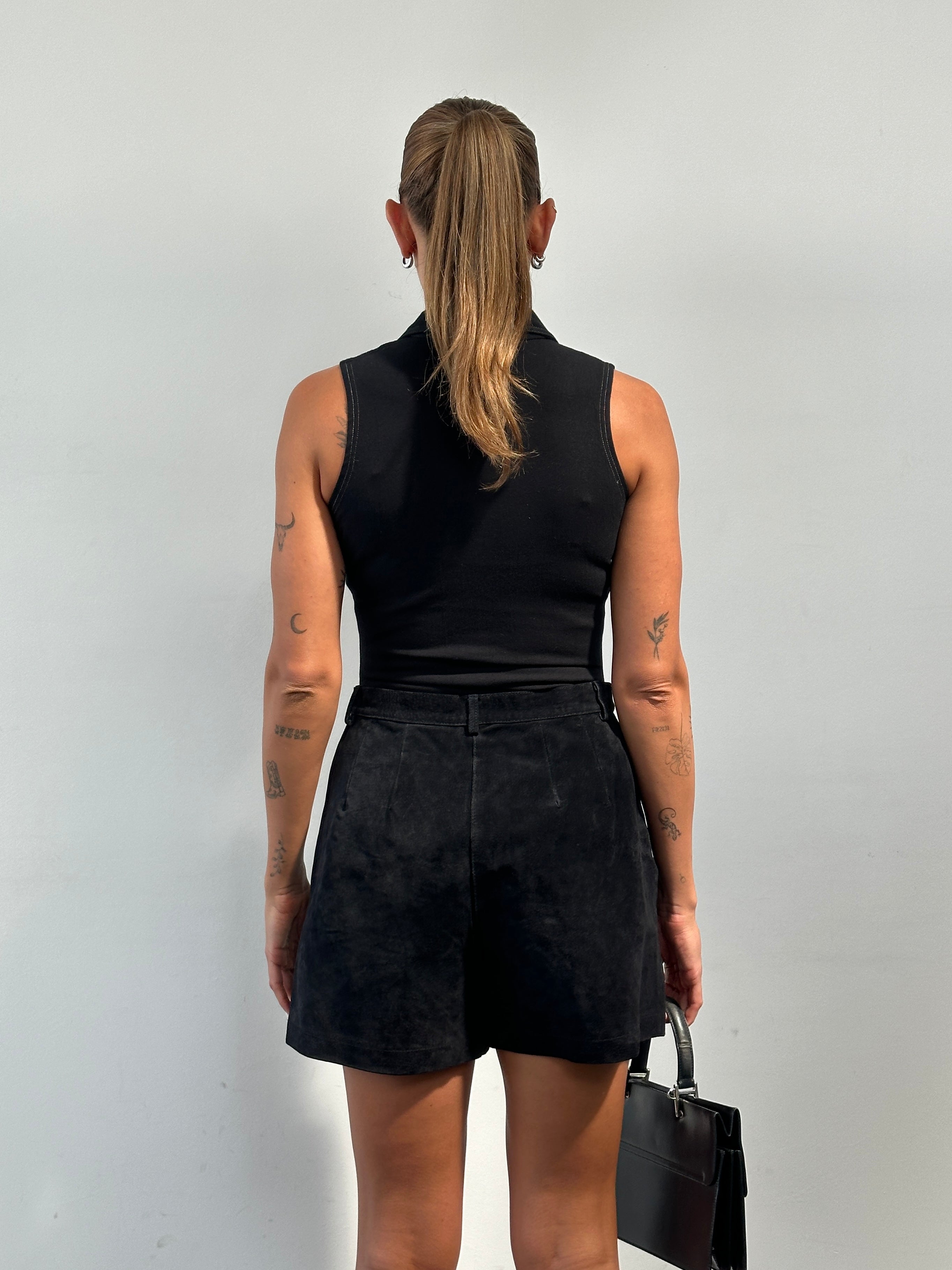 Vintage cotton contrast stitch bodysuit top in size S, featuring a fitted design and stylish stitching details.