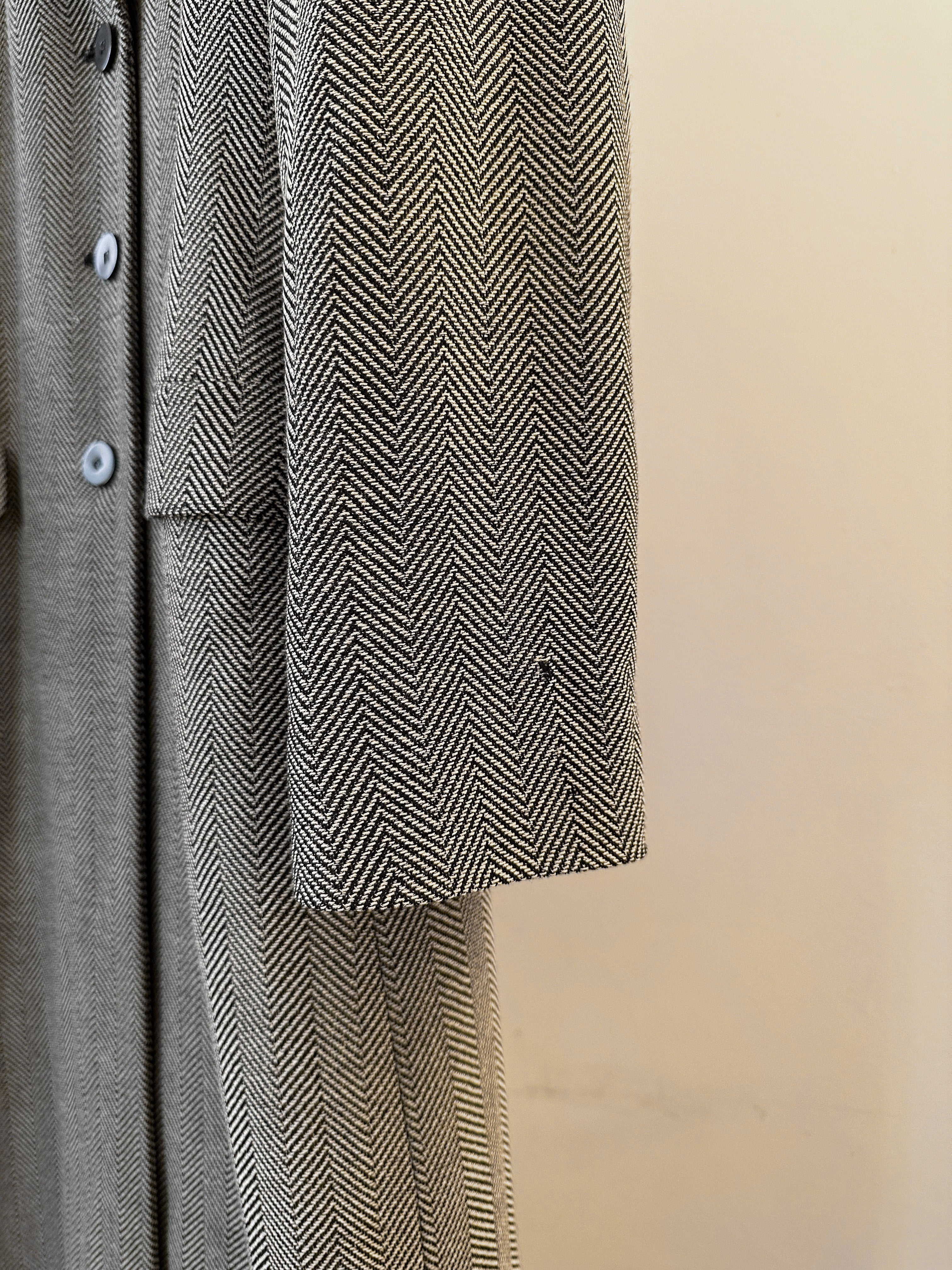 Giorgio Armani Le Collezioni men's virgin wool herringbone coat in size M, featuring classic tailored design and herringbone pattern.