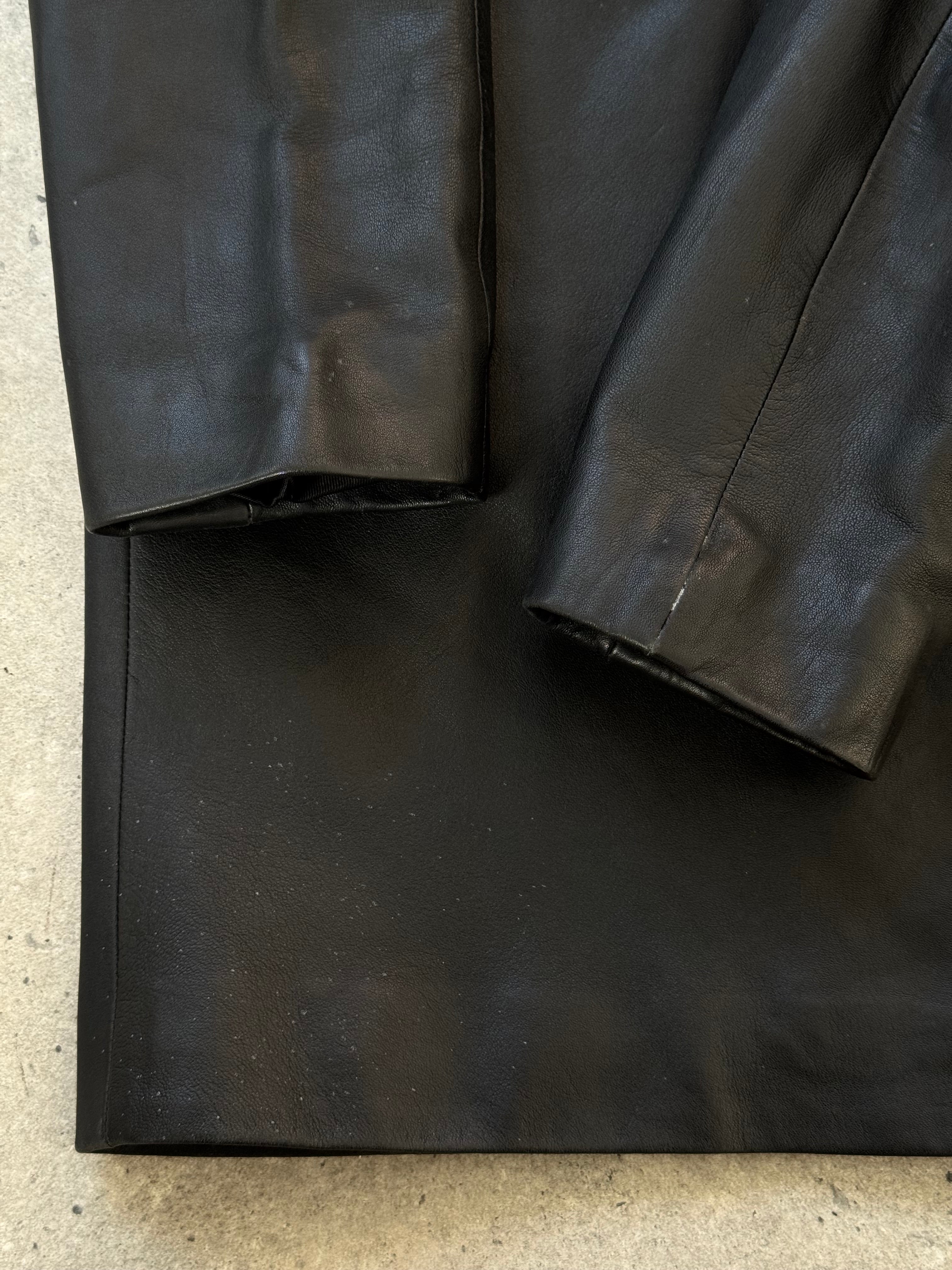 St Michael 1990s lambskin smooth leather trench coat in size M, showcasing classic design and high-quality leather craftsmanship.