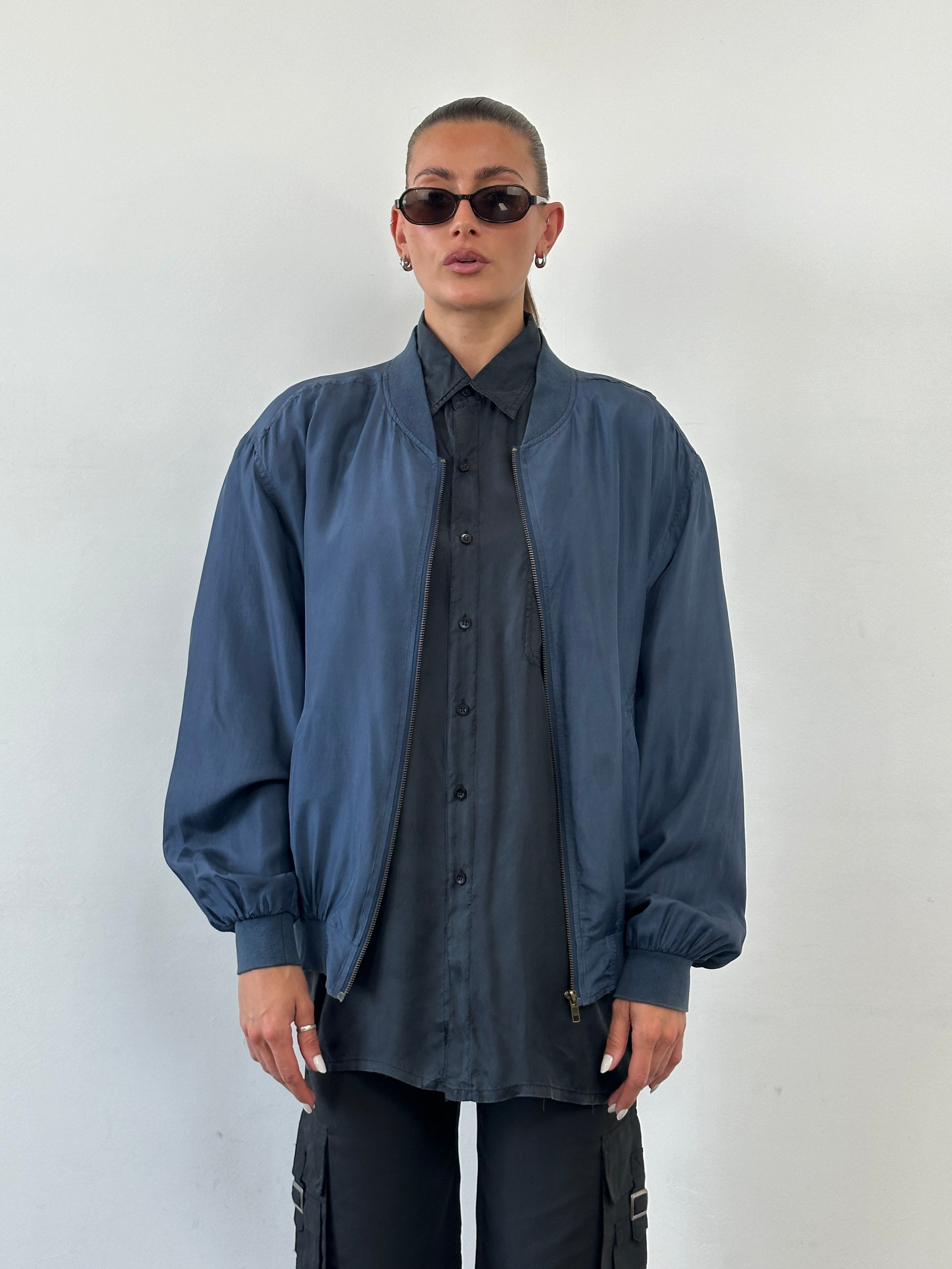 Vintage 90s pure silk bomber jacket in size large, featuring classic design and smooth fabric, by Vintage.