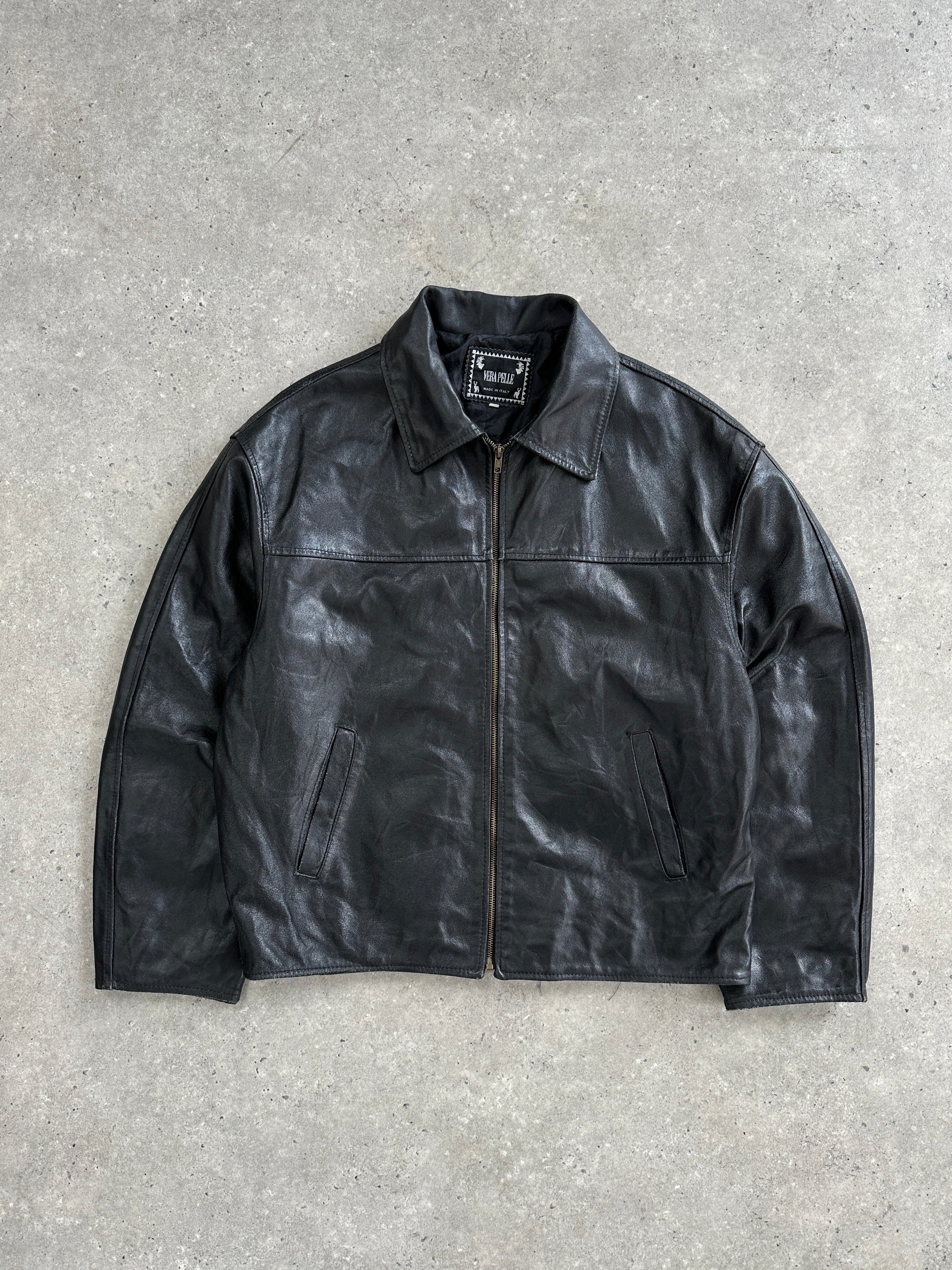 Vintage Italian leather jacket in size L, featuring classic distressed leather and stylish design details.