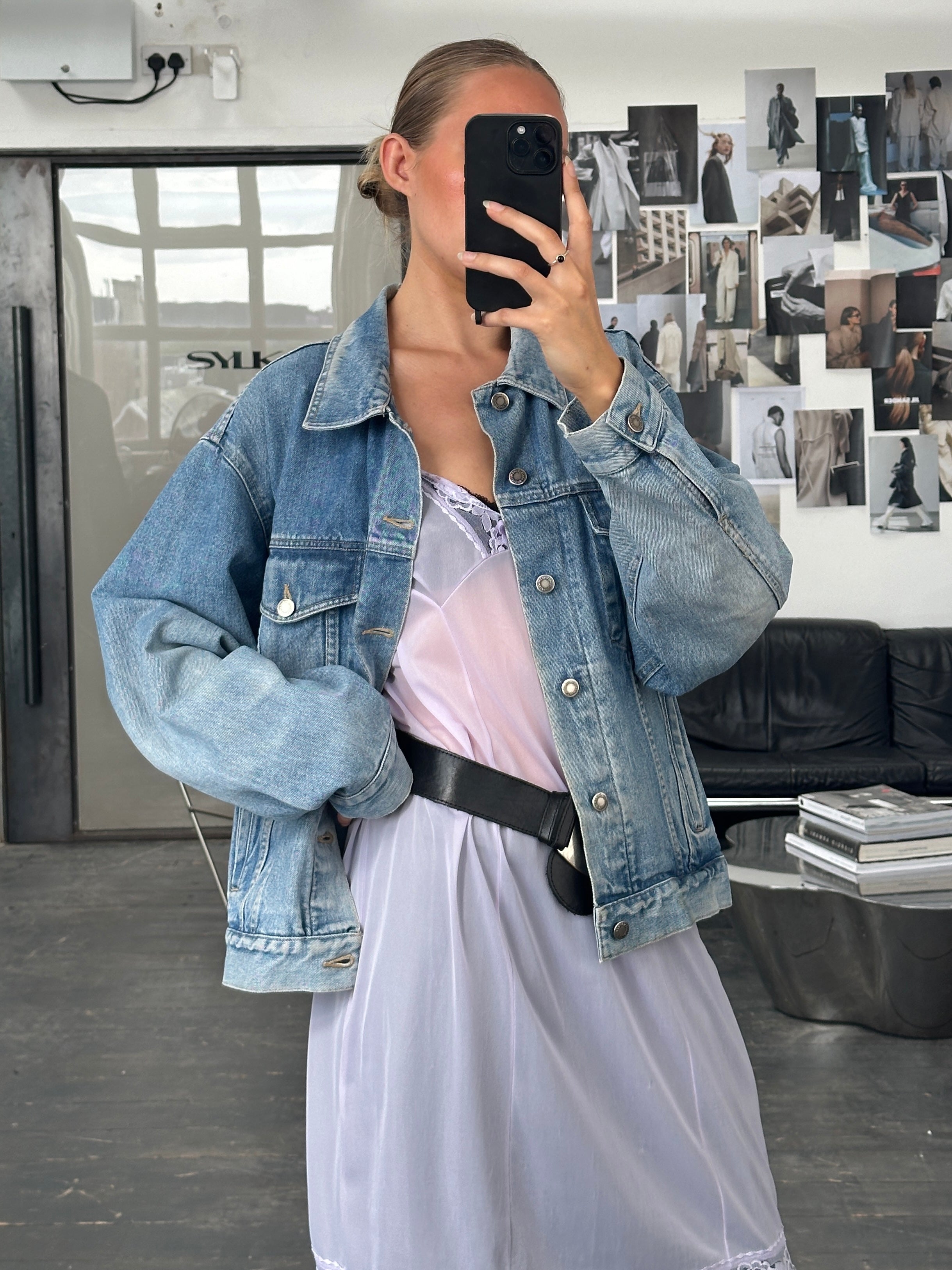 Levi’s Wrangler 1990s light wash denim jacket, L/XL, featuring classic fit and vintage style, shown on a hanger.