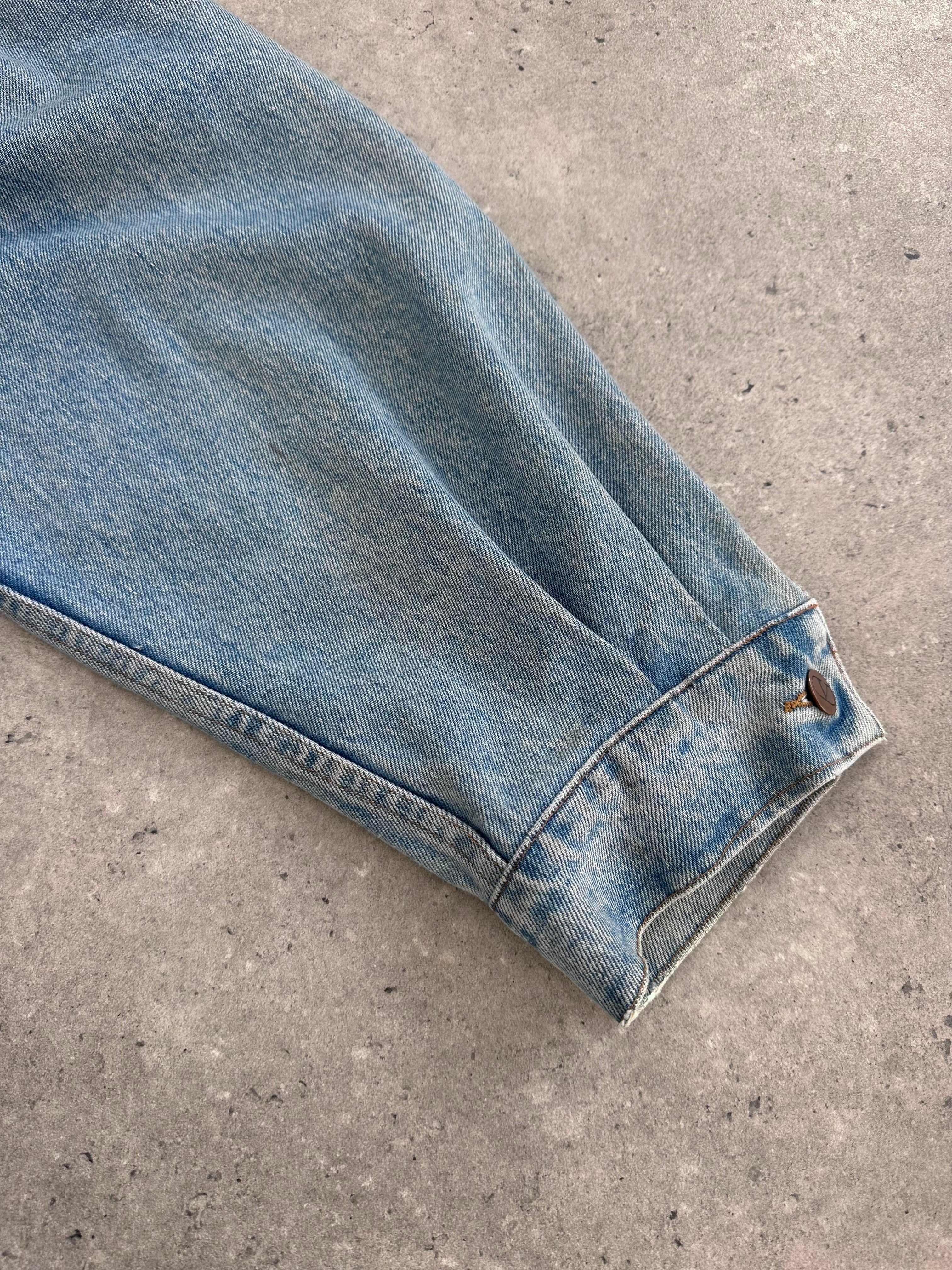 Valentino denim jacket in XL size, featuring classic blue denim with stylish stitching and button details.