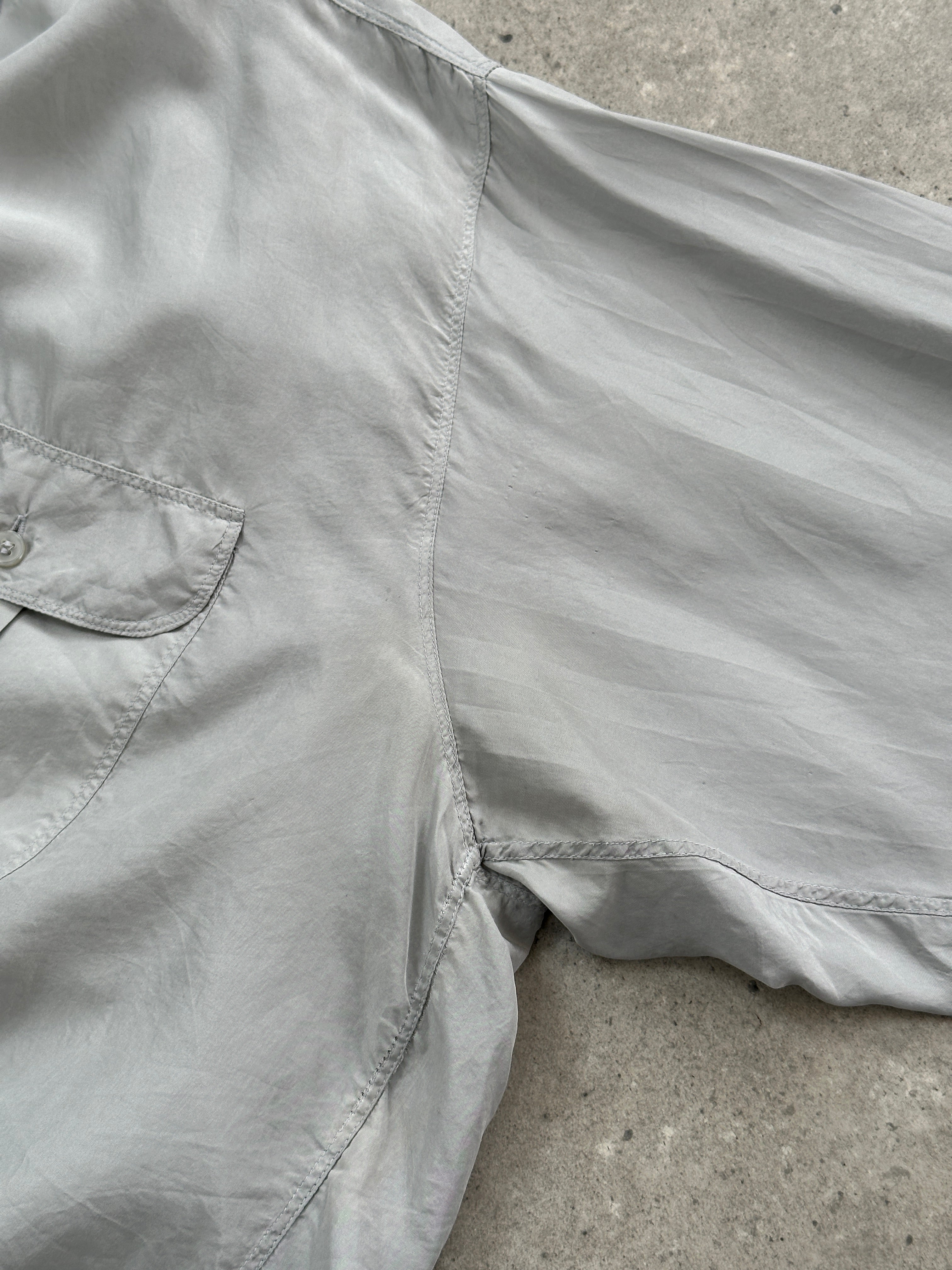 Vintage 1990s relaxed pure silk shirt in XL, featuring a classic design with smooth fabric and a comfortable fit.