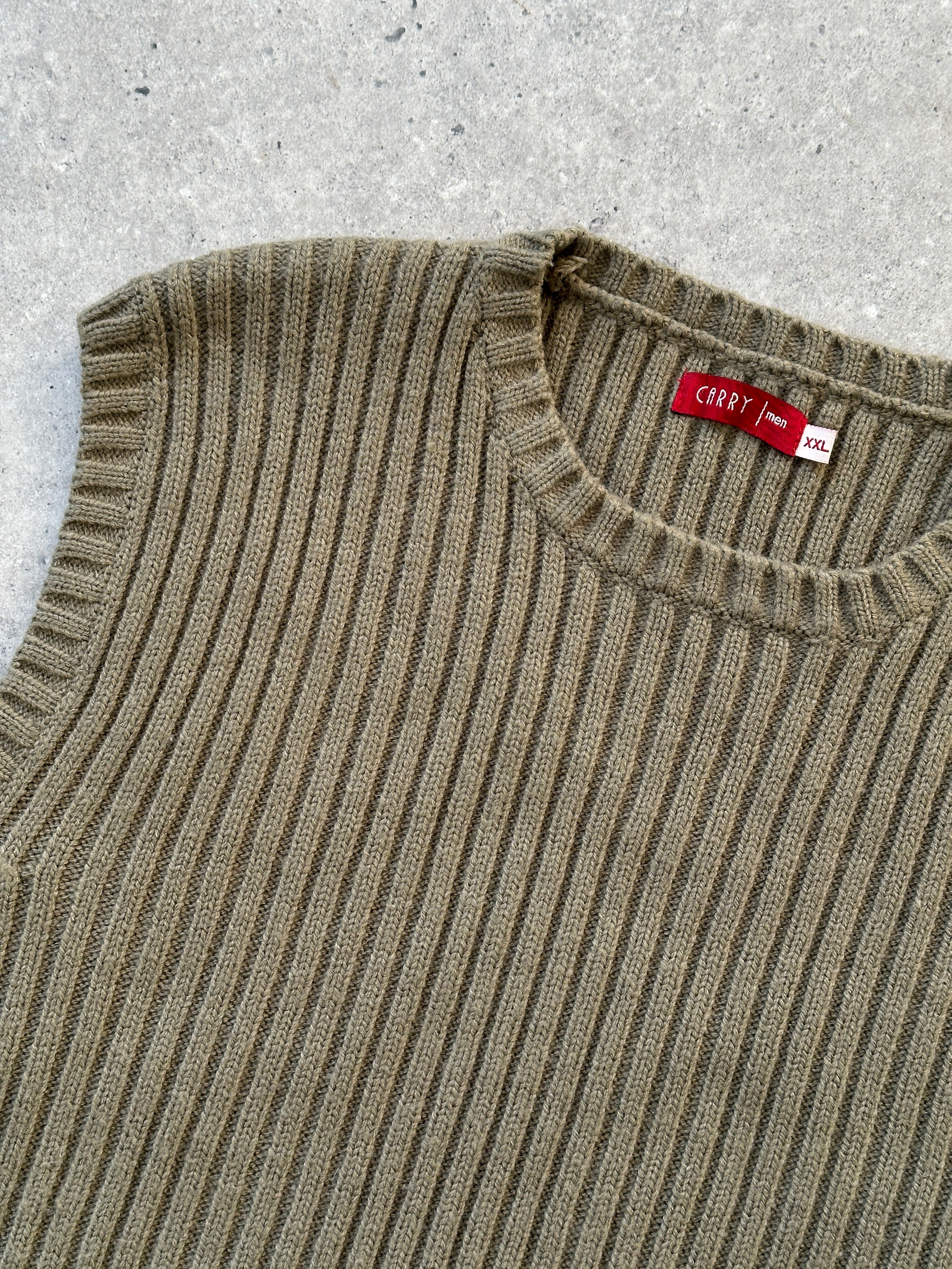 Vintage brand ribbed knit sleeveless vest jumper in size L, featuring a classic textured design and a comfortable fit.