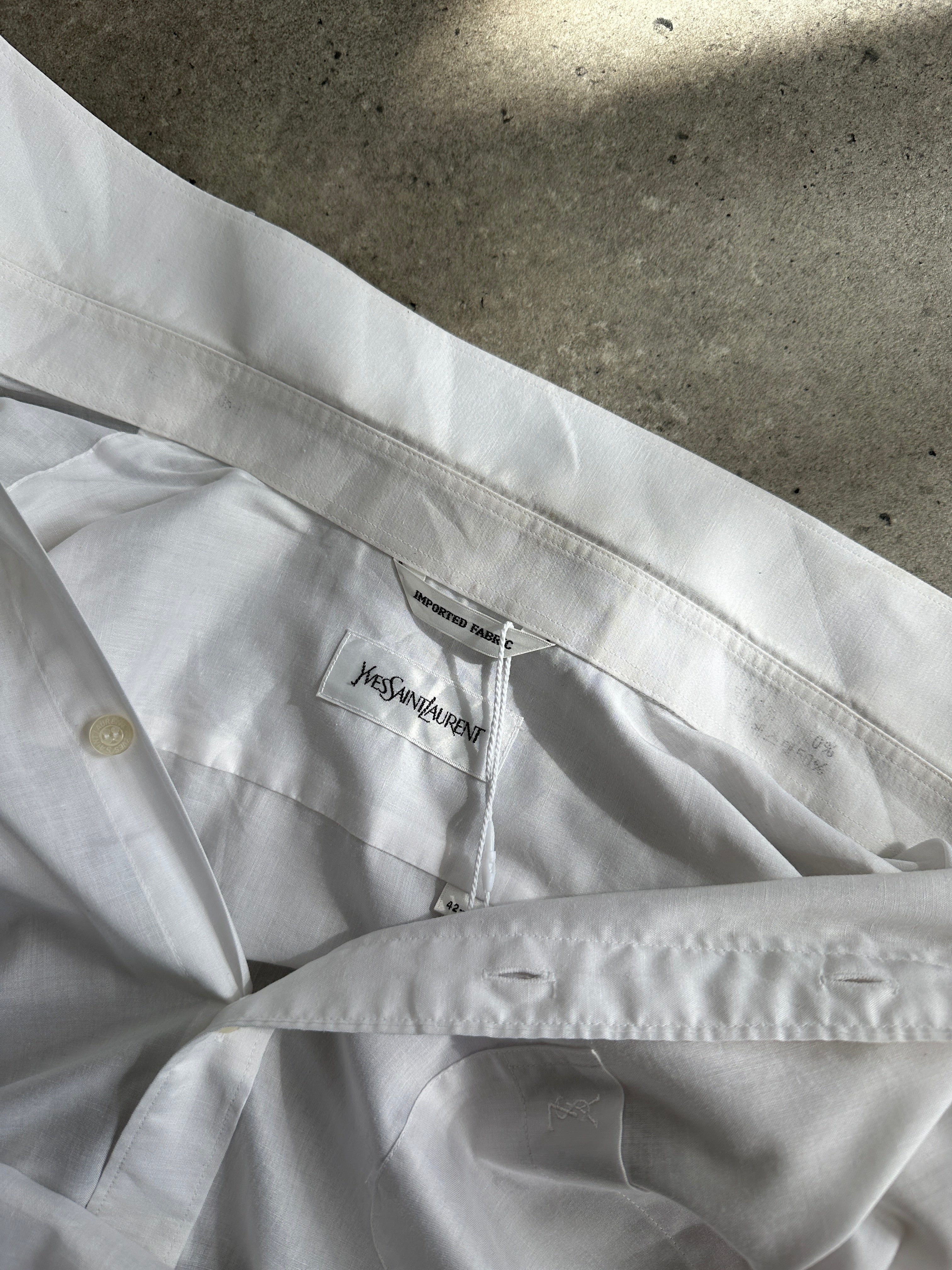 Yves Saint Laurent 90s cotton logo shirt in size L/XL, featuring a classic design with the brand's signature logo on the front.