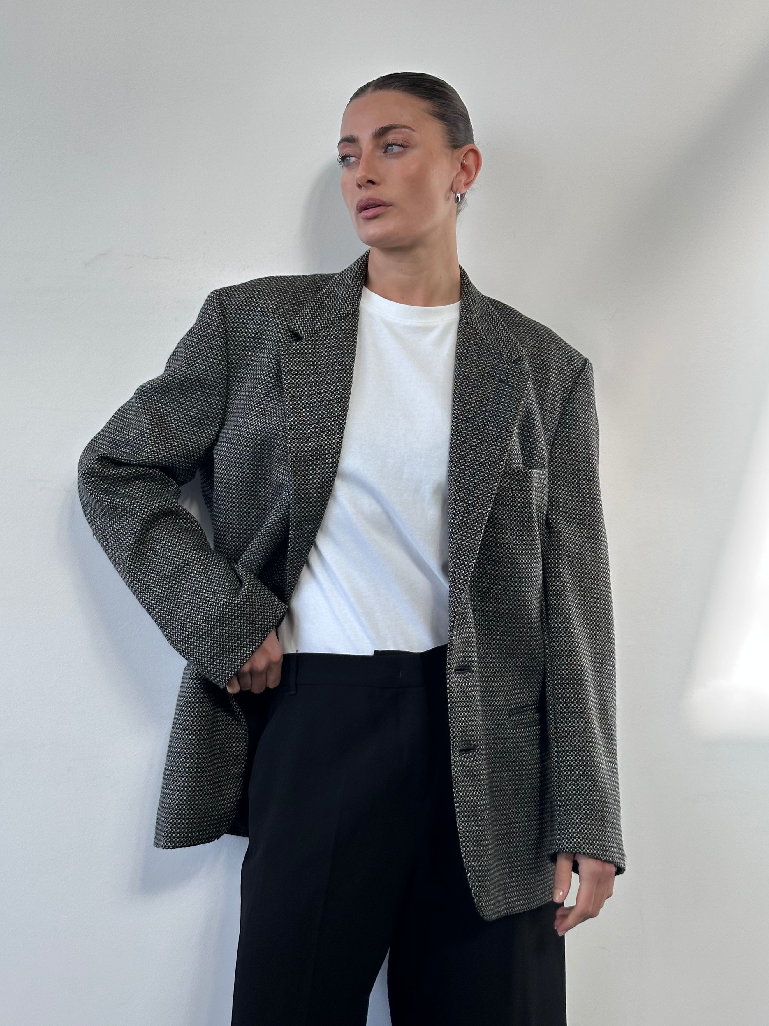 Gianni Versace Versus 90s pure wool single-breasted blazer in size 40R/L, navy blue with classic tailored fit.