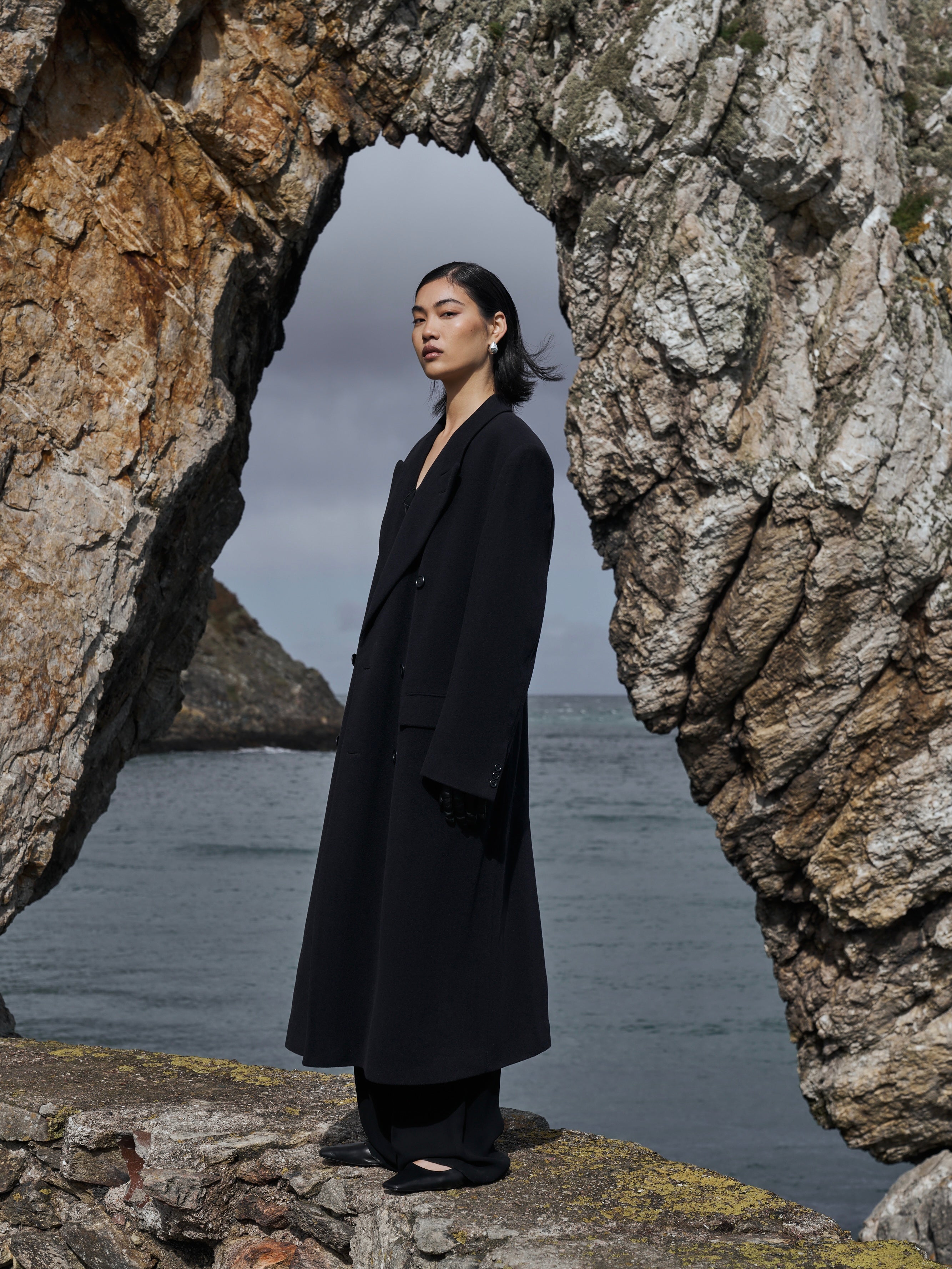 Pierre Cardin 1990s wool and cashmere double-breasted floor-length coat in XL, shown hanging on a clothing rack.