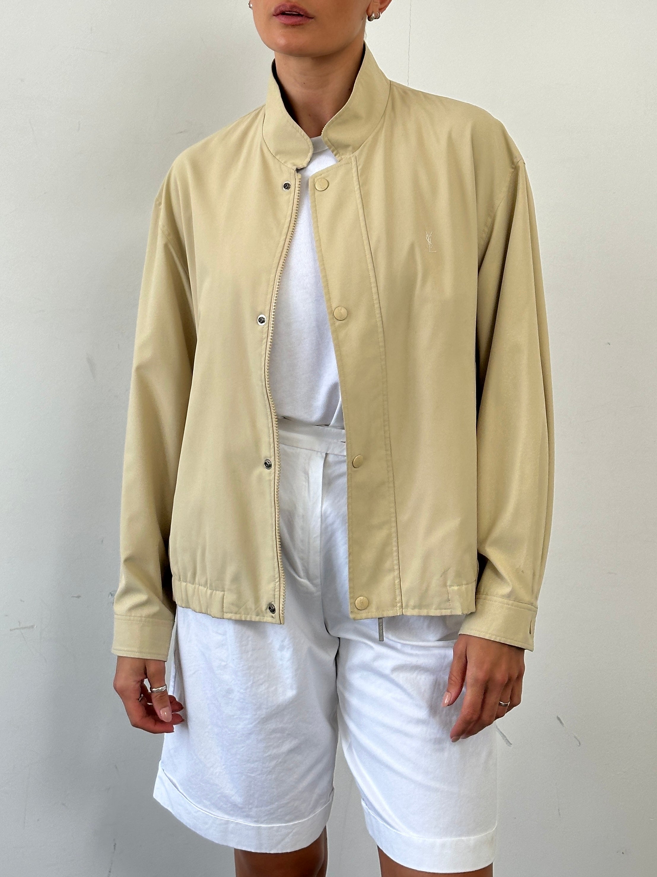 Yves Saint Laurent Pour Homme logo bomber jacket in size L, black jacket with YSL branding and ribbed cuffs and collar.