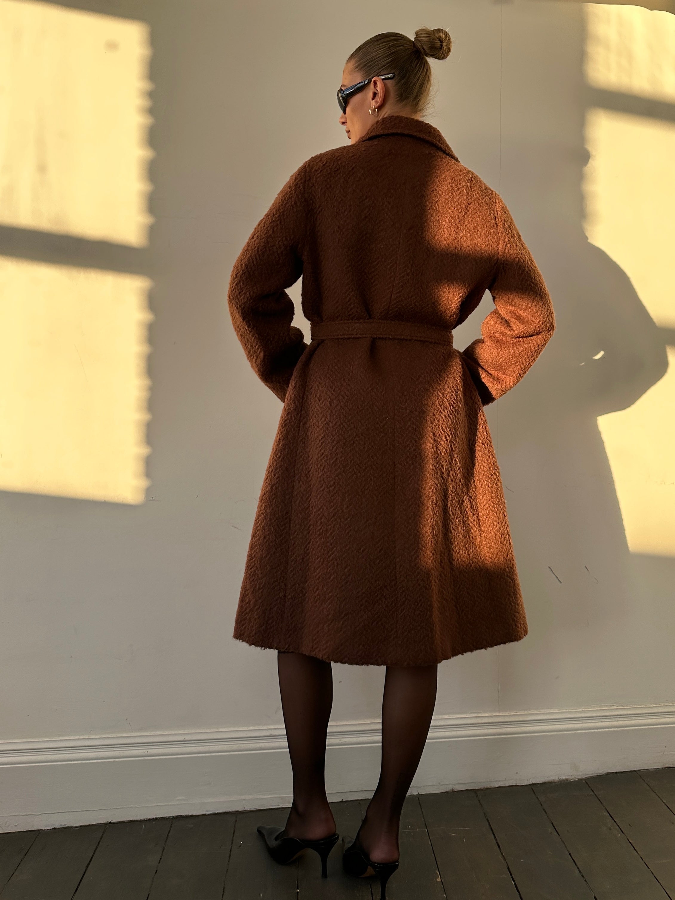 Vintage Italian mohair wool double-breasted belted coat in beige, featuring classic lapels and a cozy, textured fabric.