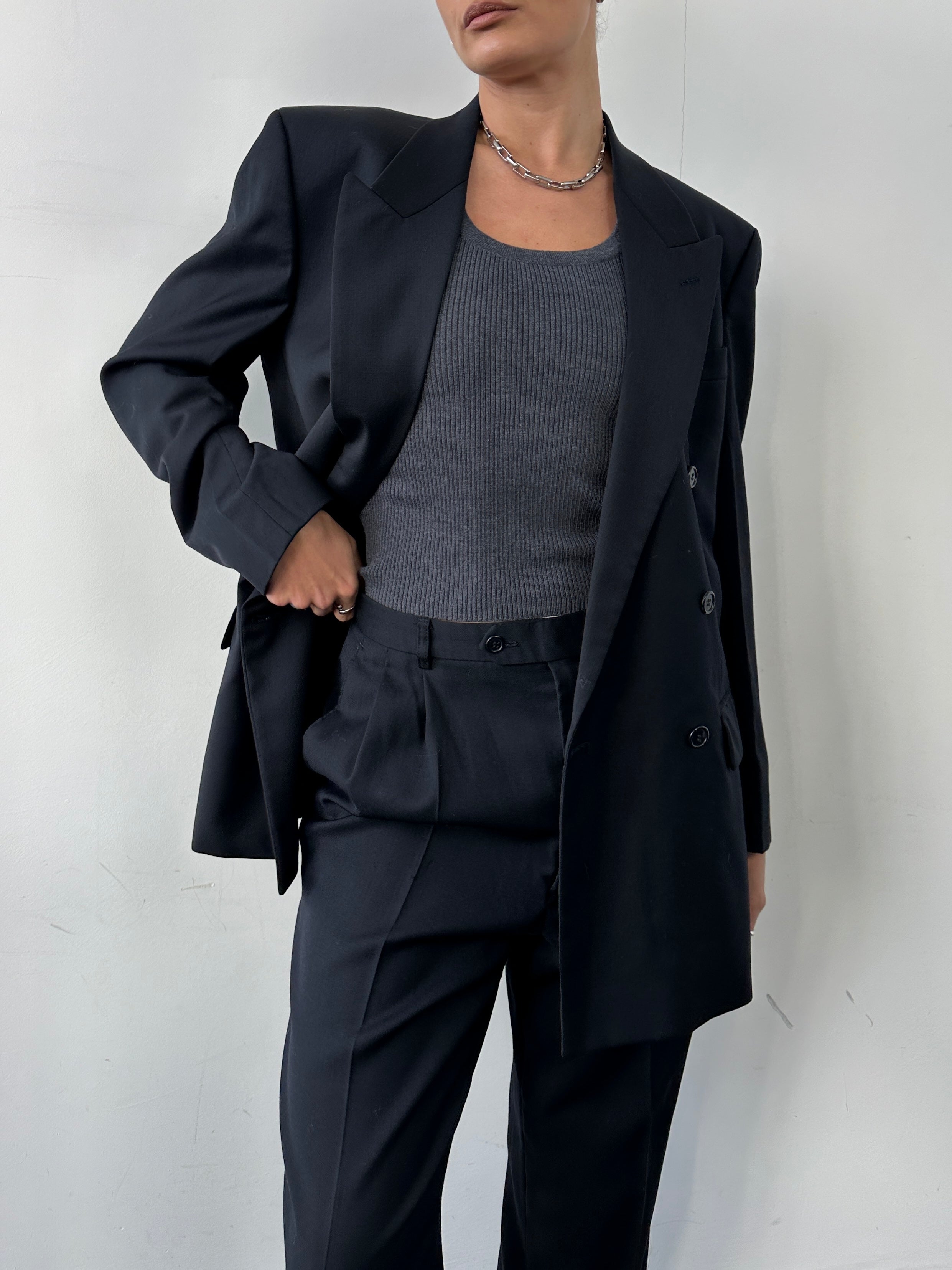 Pierre Cardin pure wool double-breasted blazer in size 40R/L, shown on a hanger with classic tailored design.