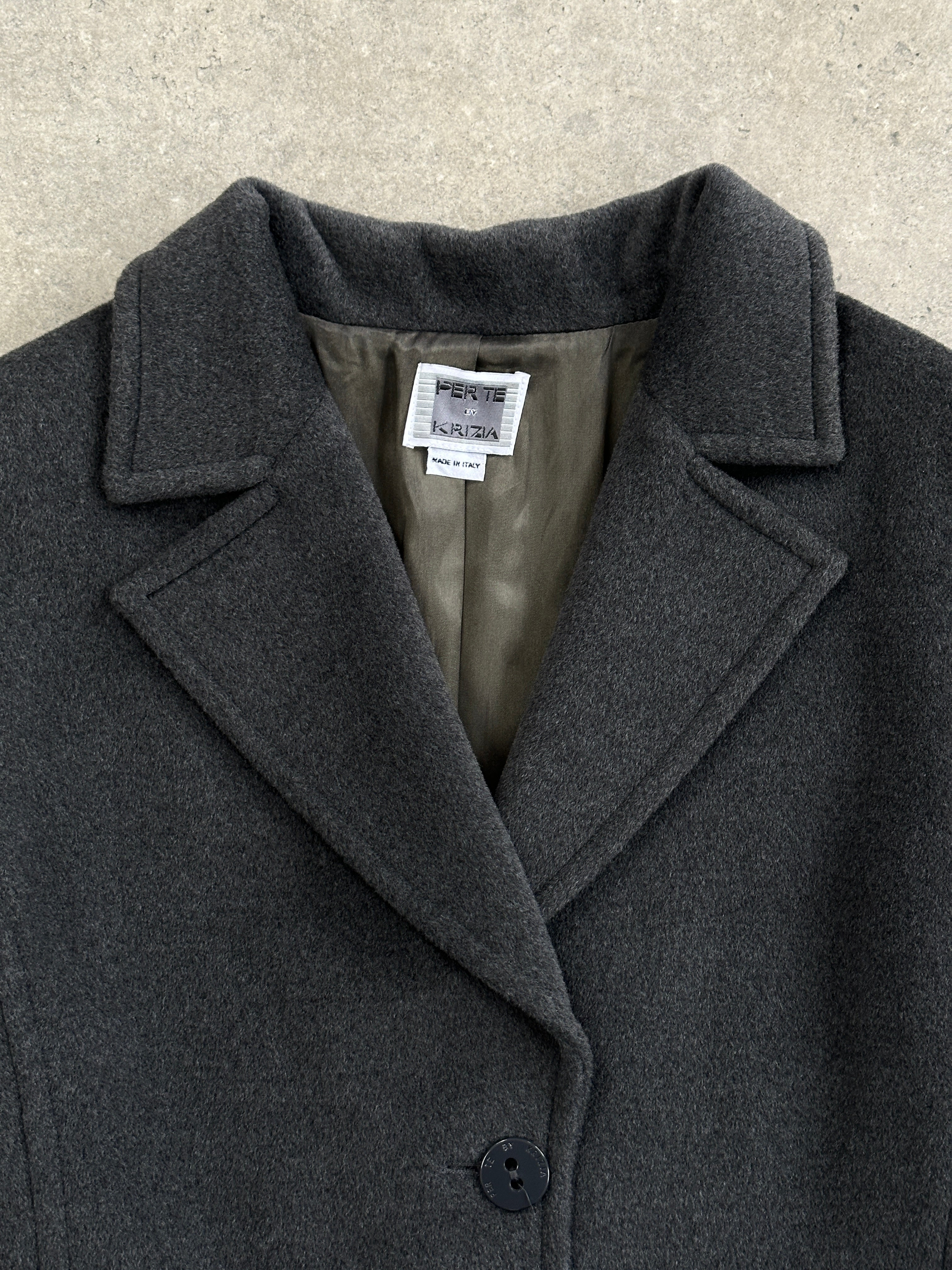 Krizia 1990s Virgin Wool Coat, medium size, stylish jacket with tailored fit and classic design, shown on a hanger.