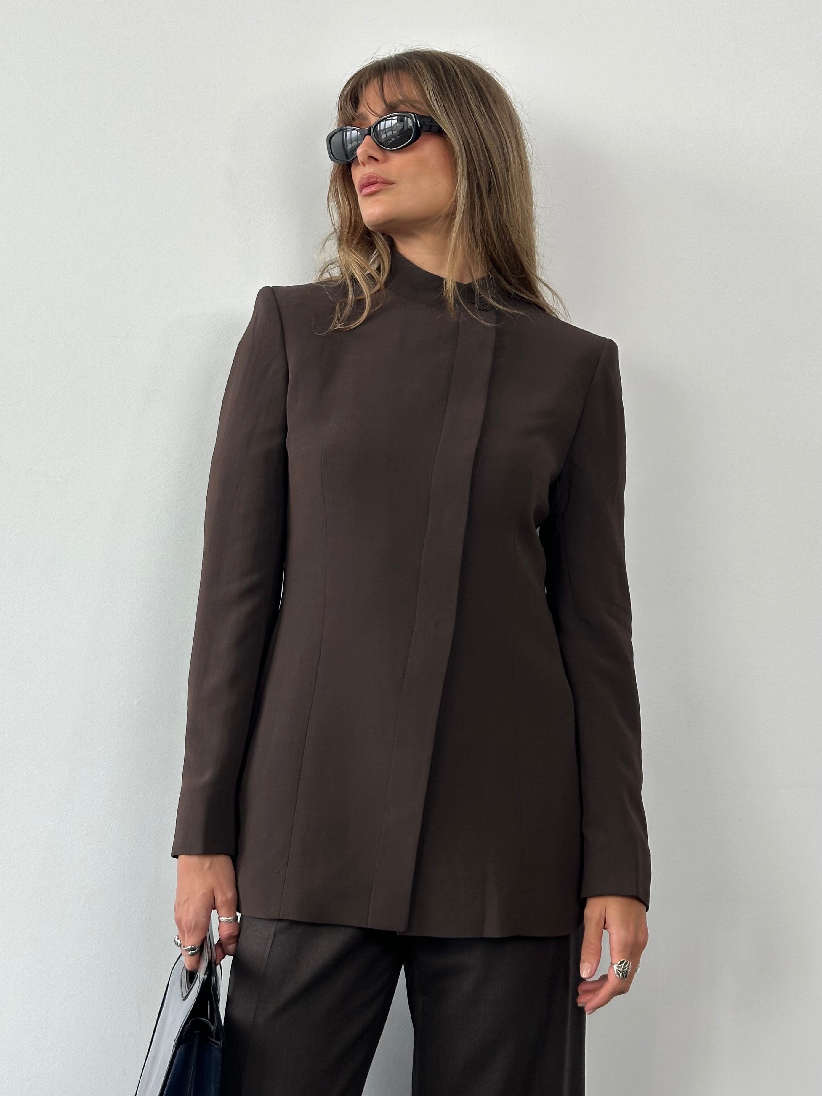 Max Mara 2000s fitted high neck asymmetric tailored blazer, front view showing structured design and tailored fit.