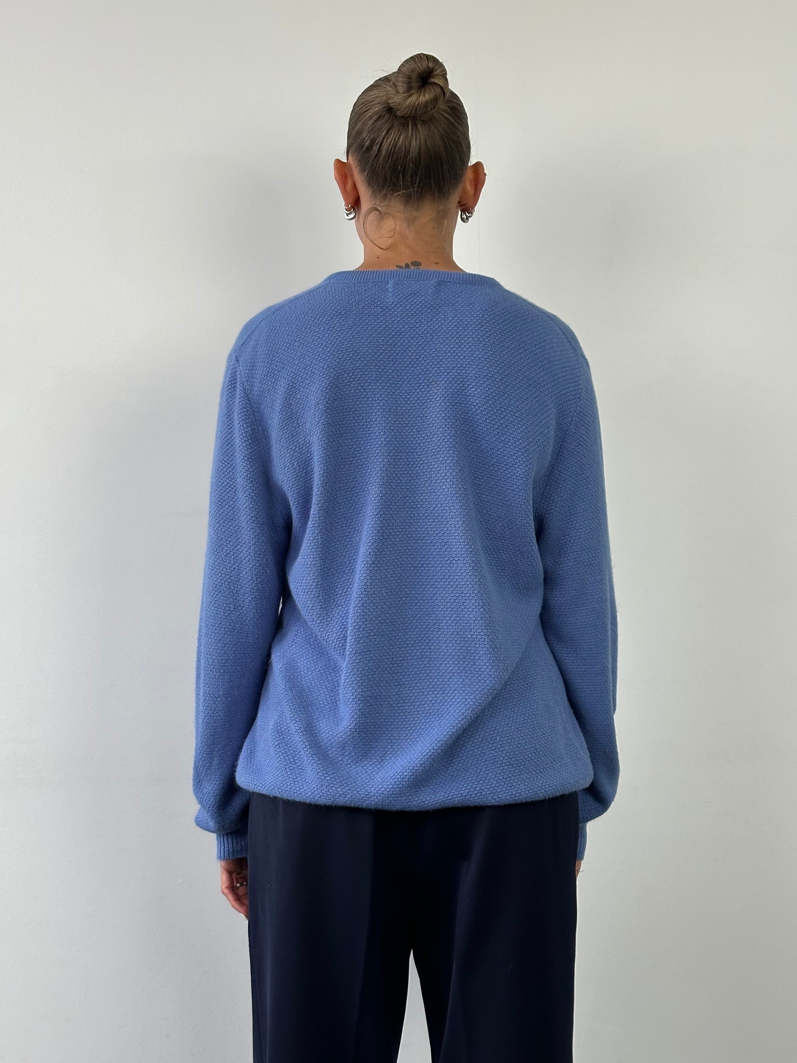 Christian Dior 1980s V-neck knitted logo jumper in size L, featuring classic Dior branding and a cozy knitted design.