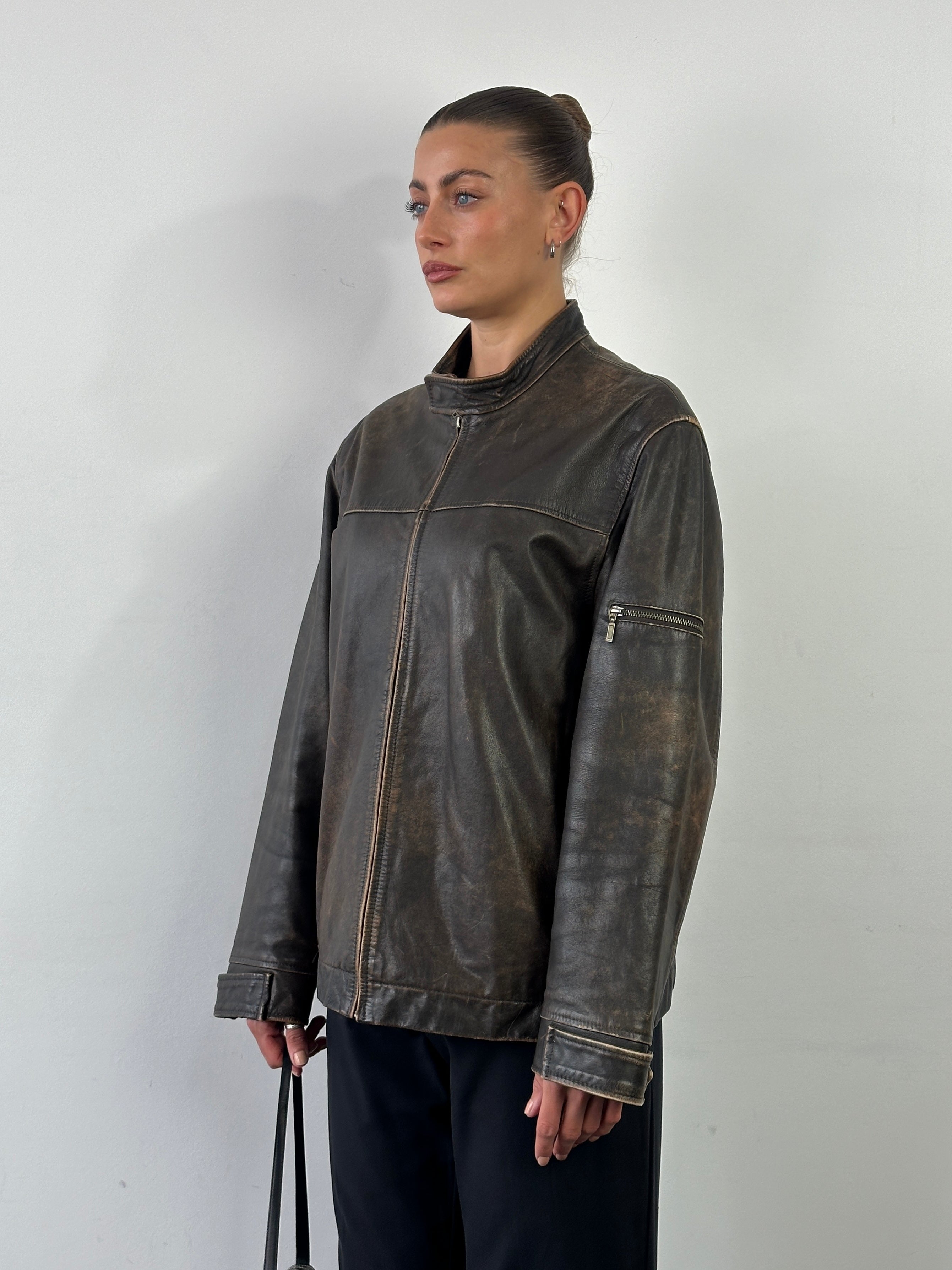 Vintage Moto aged leather jacket in large size, featuring classic distressed leather and rugged style.