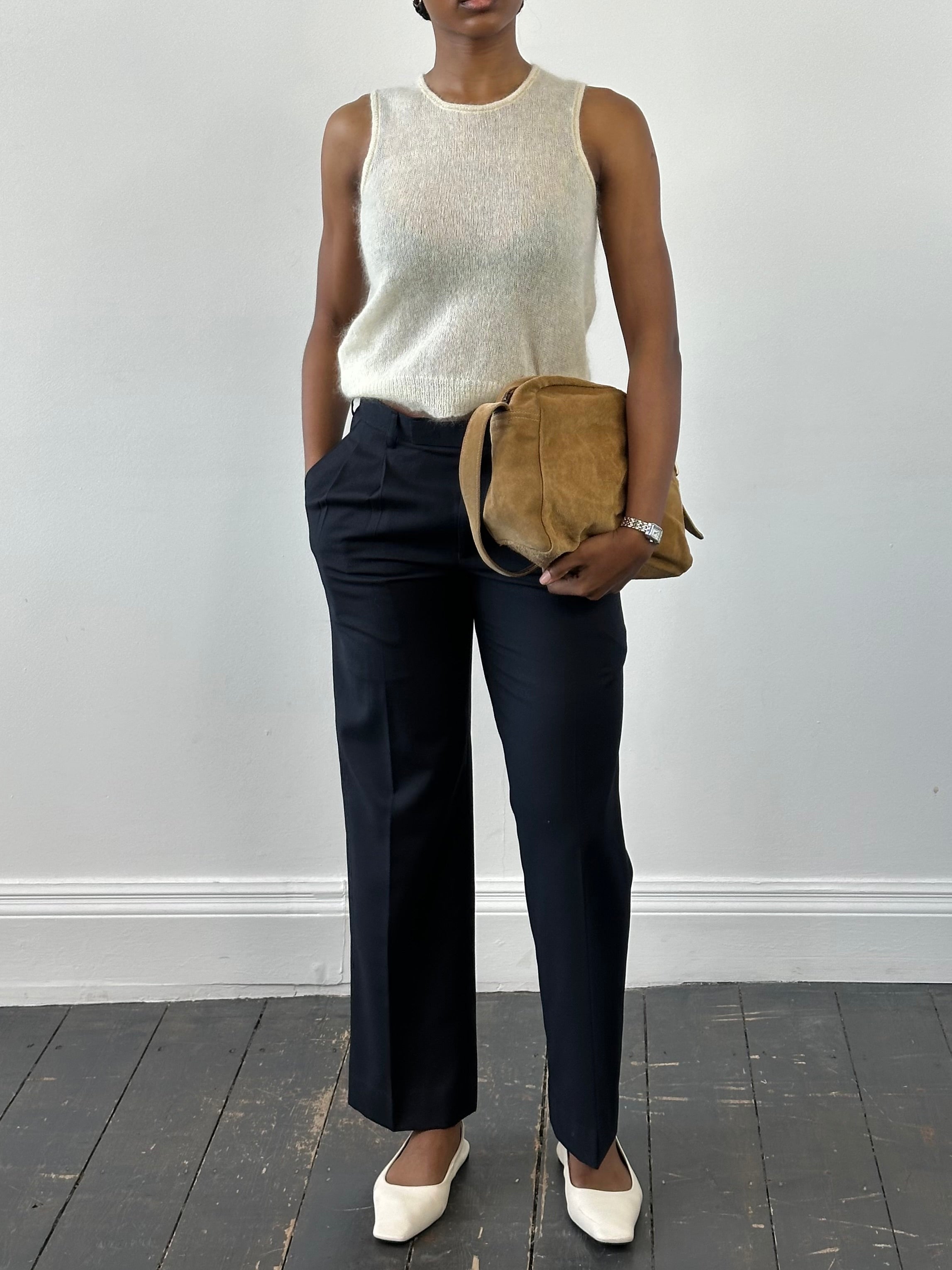 Vintage 2000s wool tailored trousers with pleats and straight leg fit, size W28, featuring classic vintage style.