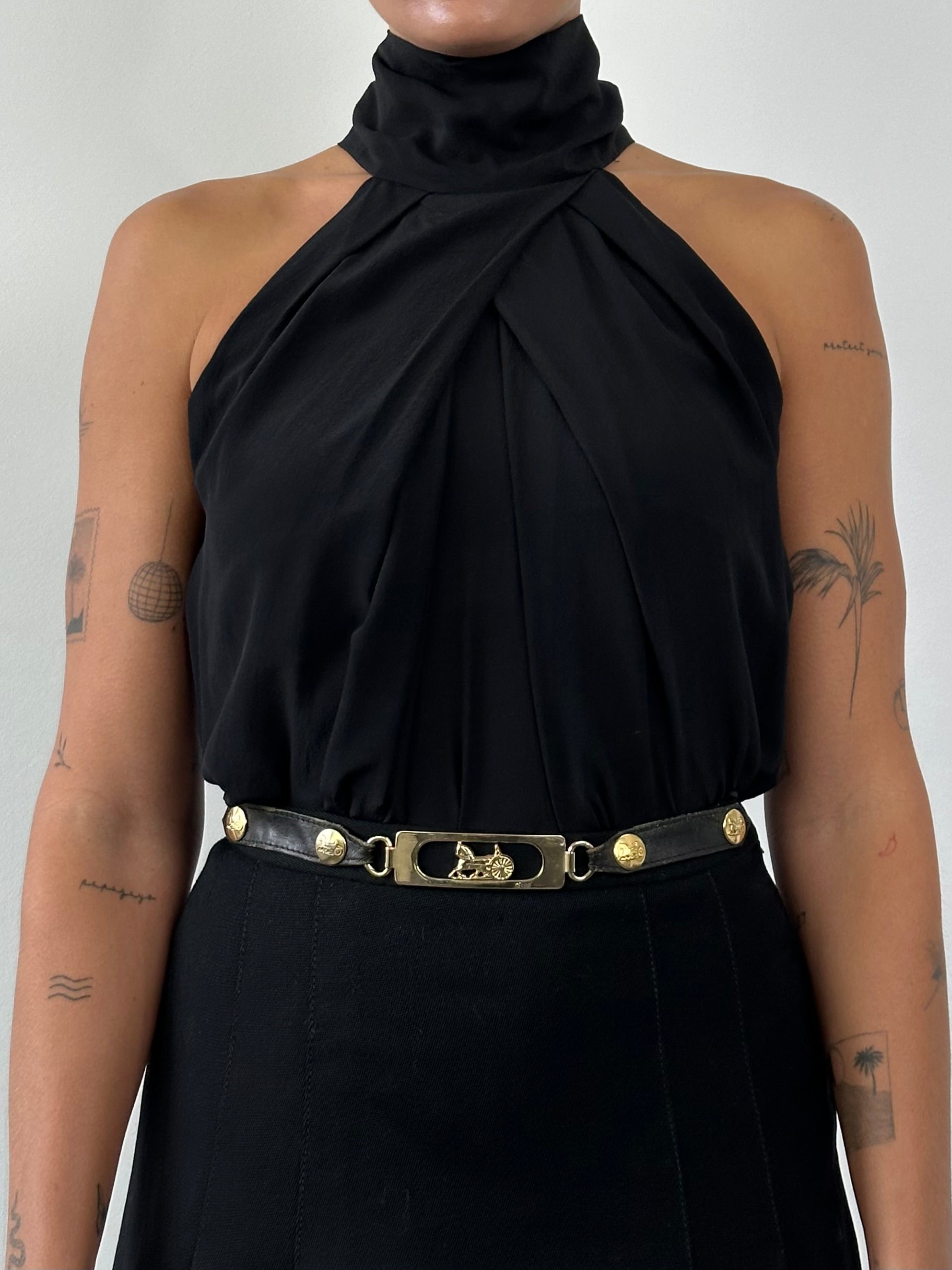 Vintage halter neck layered tank top in size small, featuring a stylish vintage design with layered fabric and a halter neckline.