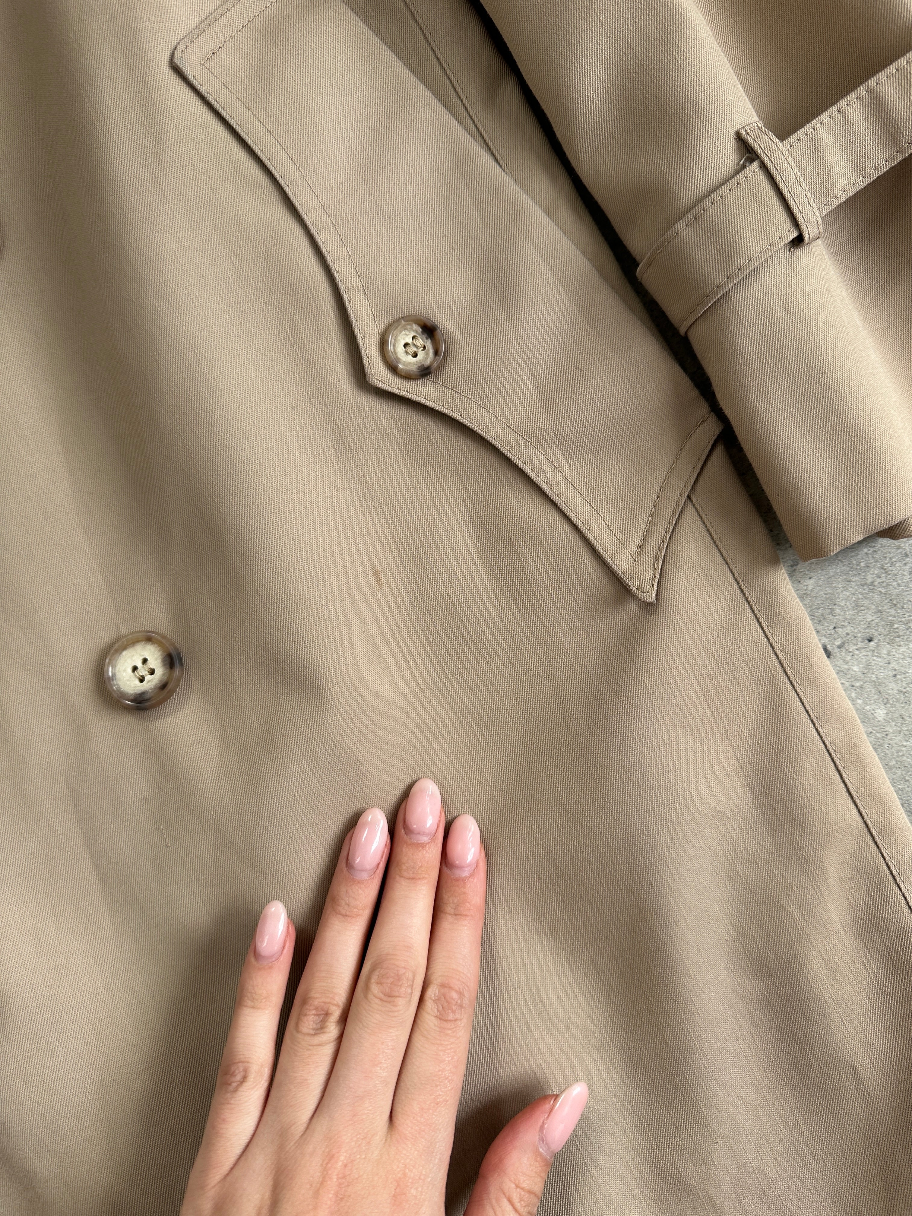 Christian Dior Monsieur double-breasted belted trench coat in beige, front view with lapels and waist belt, L/XL size.