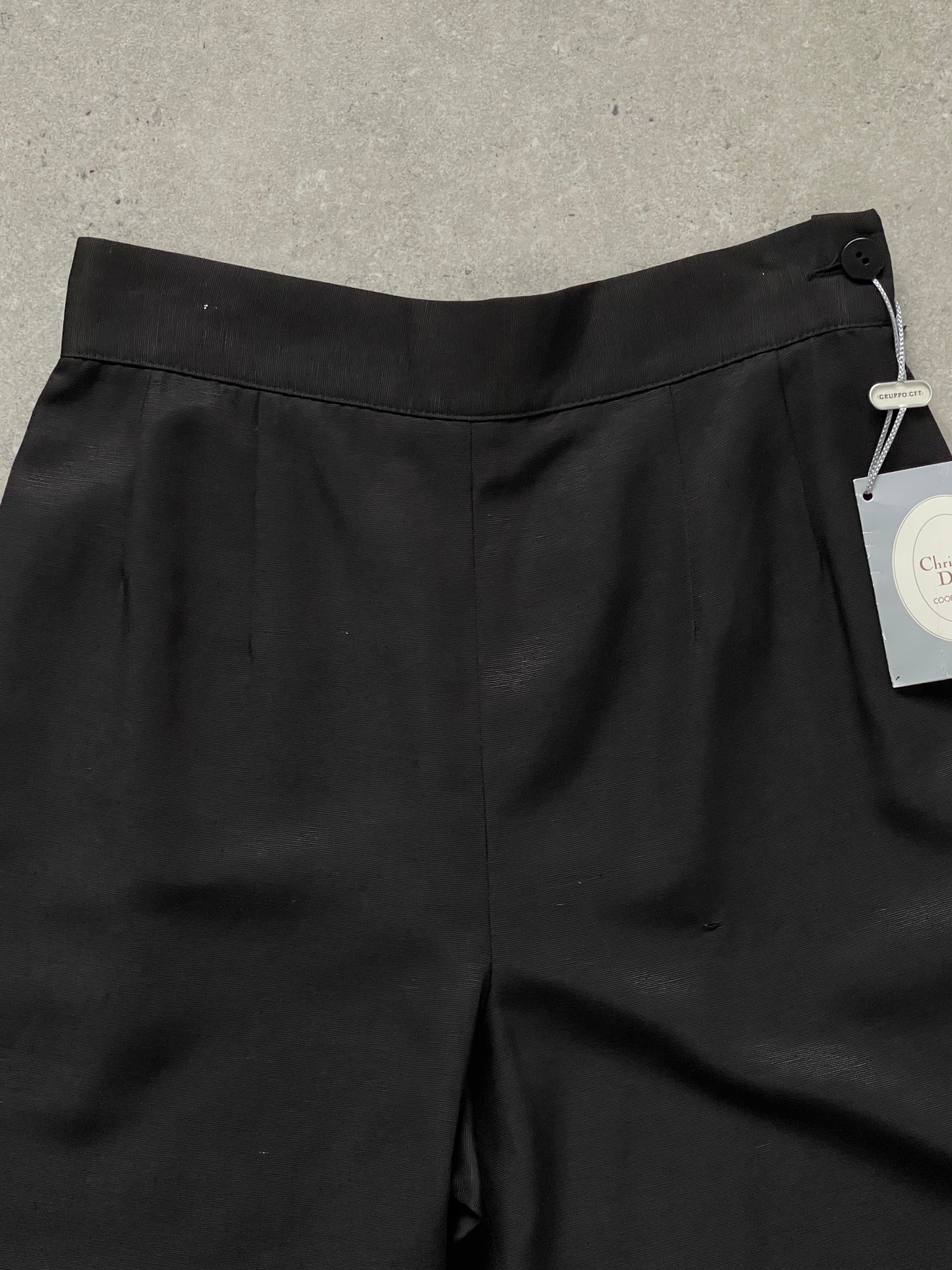 Christian Dior 1990s silk tapered leg trousers in W24, featuring a sleek silhouette and elegant fabric detail.